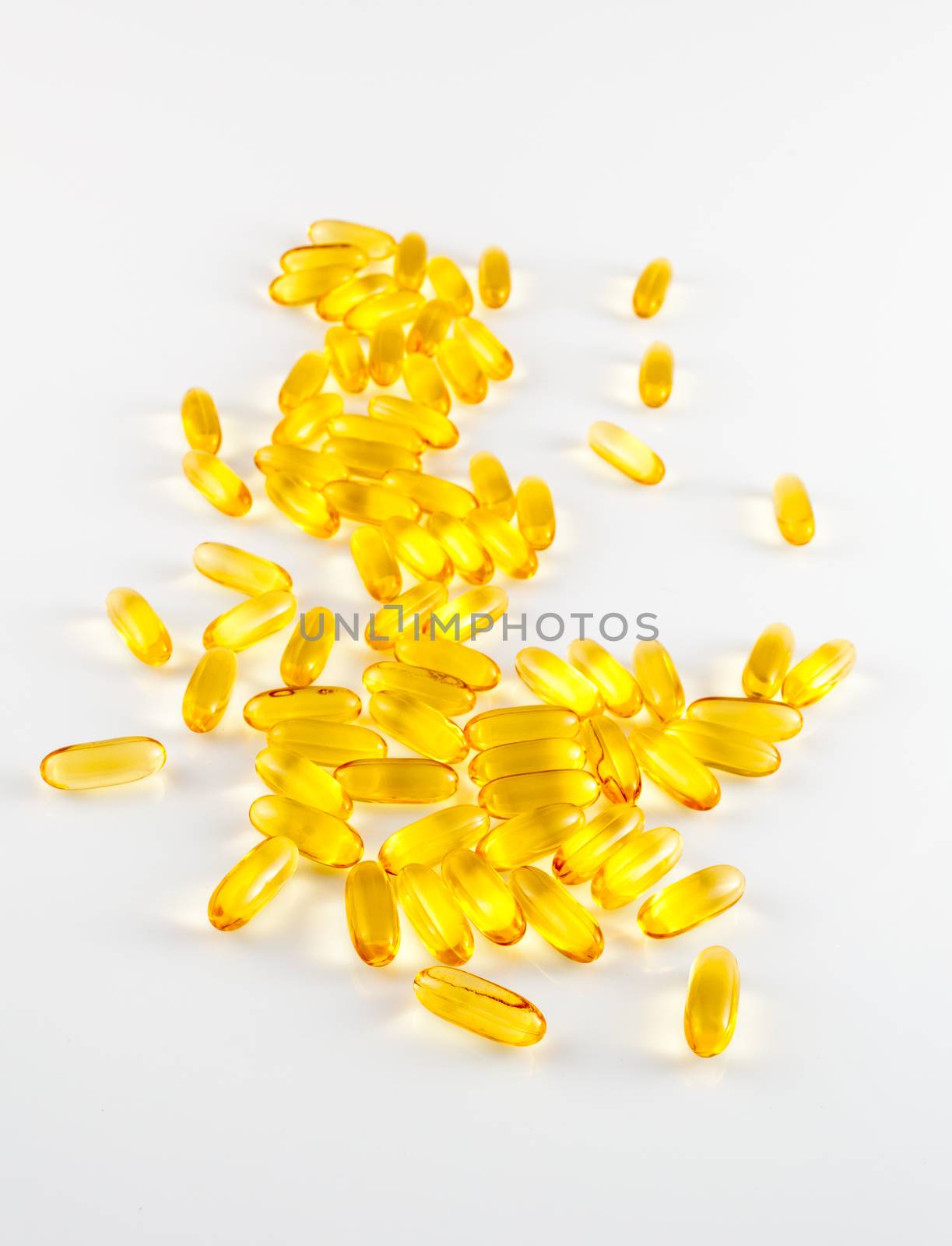 Various pills of supplement on white background