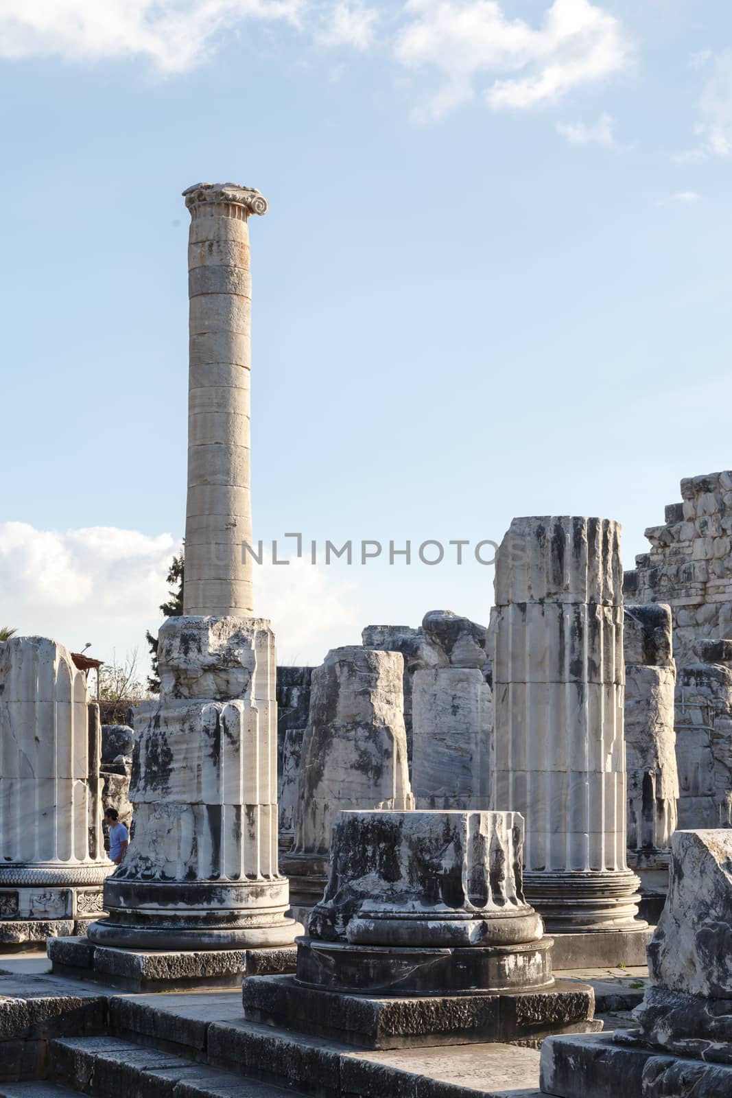 View of Apollon Temple in Didyma Ancient City in Aydın Turkey, on cloudy blue sky bakcground.