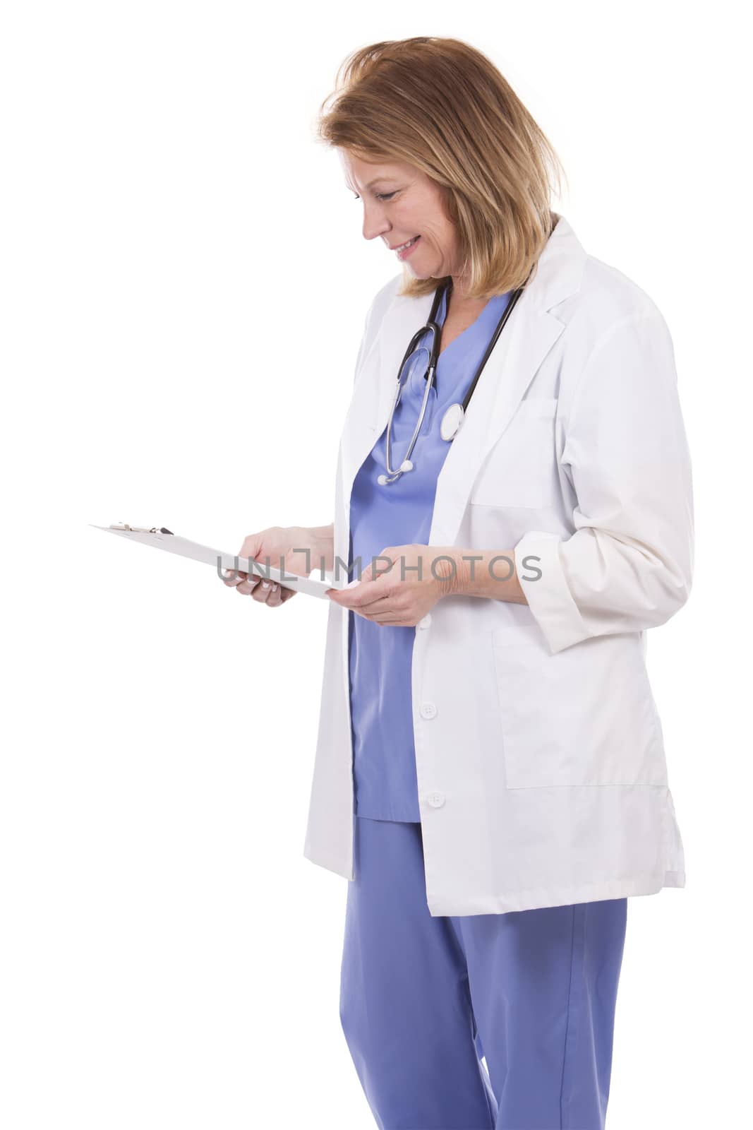 caucasian woman wearing doctor's scrubs on white background