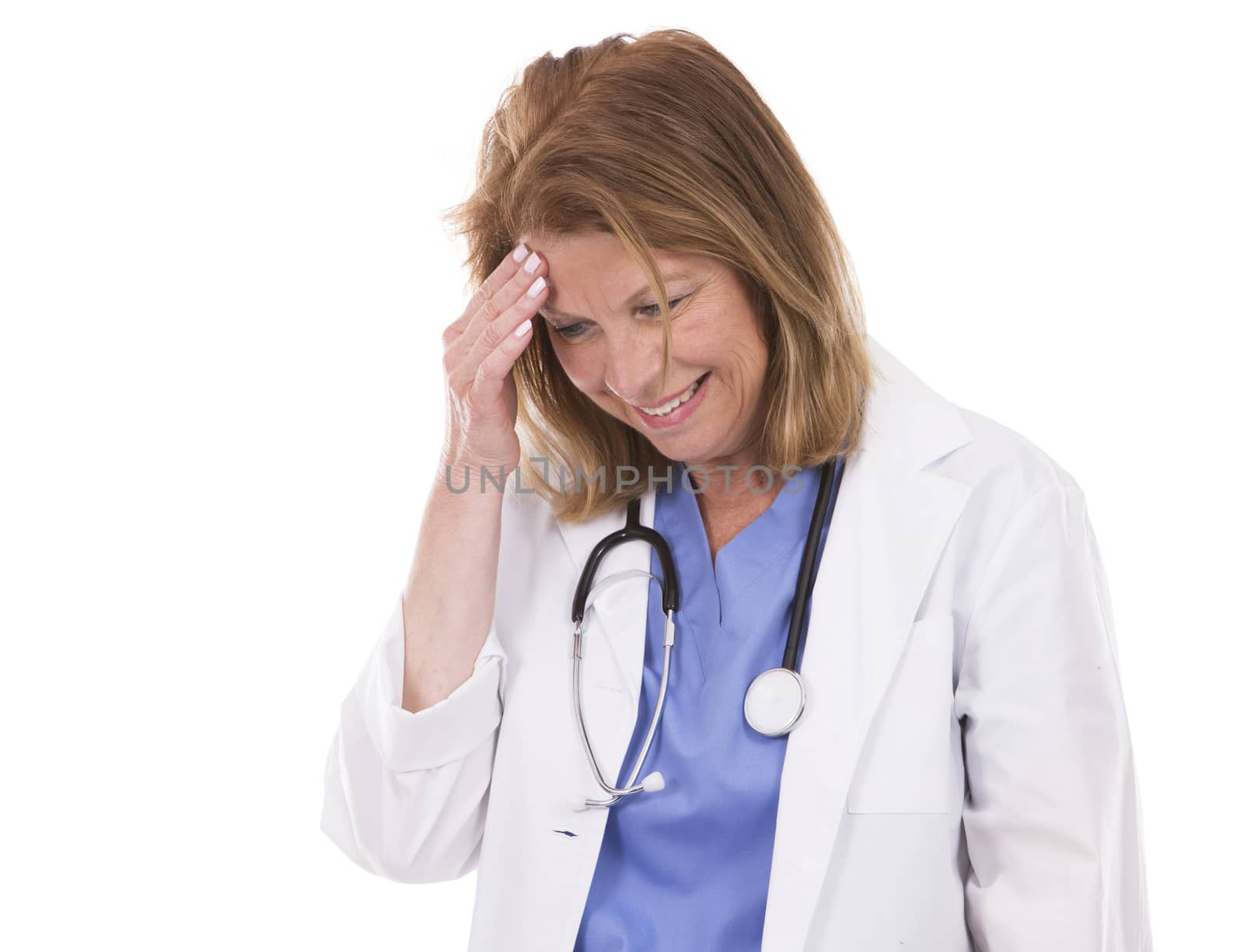 caucasian woman wearing doctor's scrubs on white background