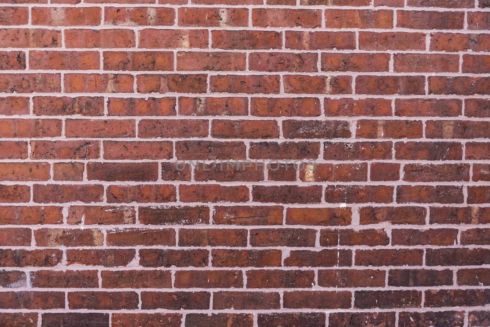 Background of red brick wall texture taken in America