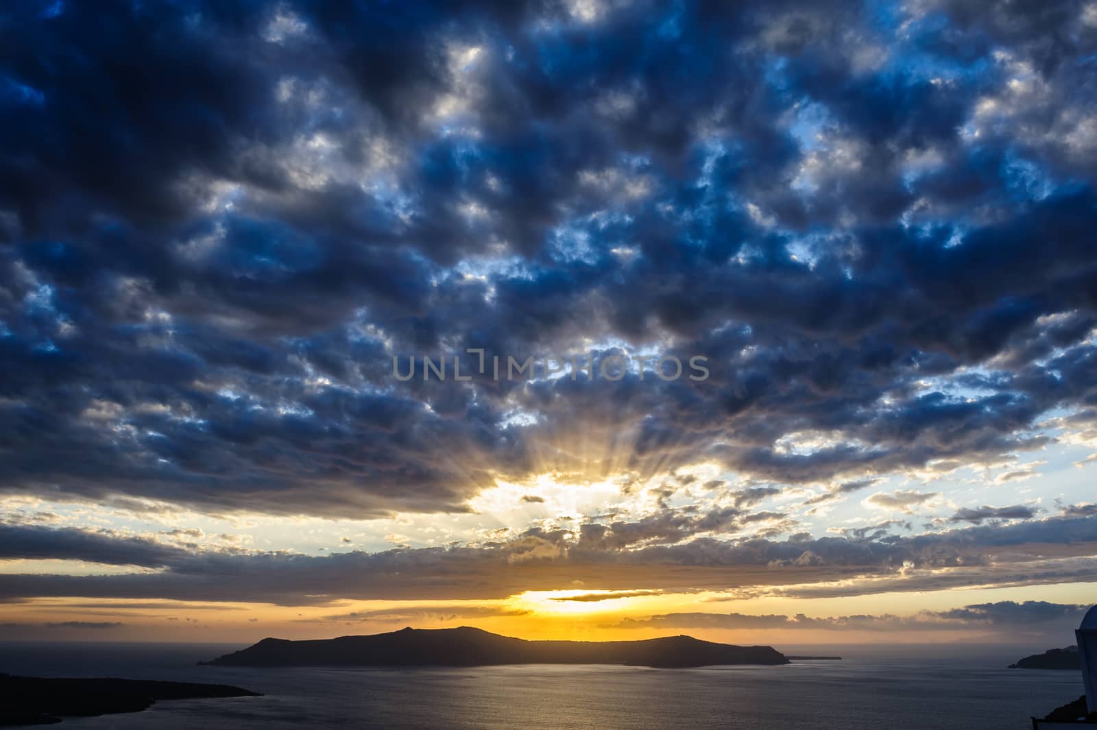 Dramatic sunset over Santorini caldera sea by starush