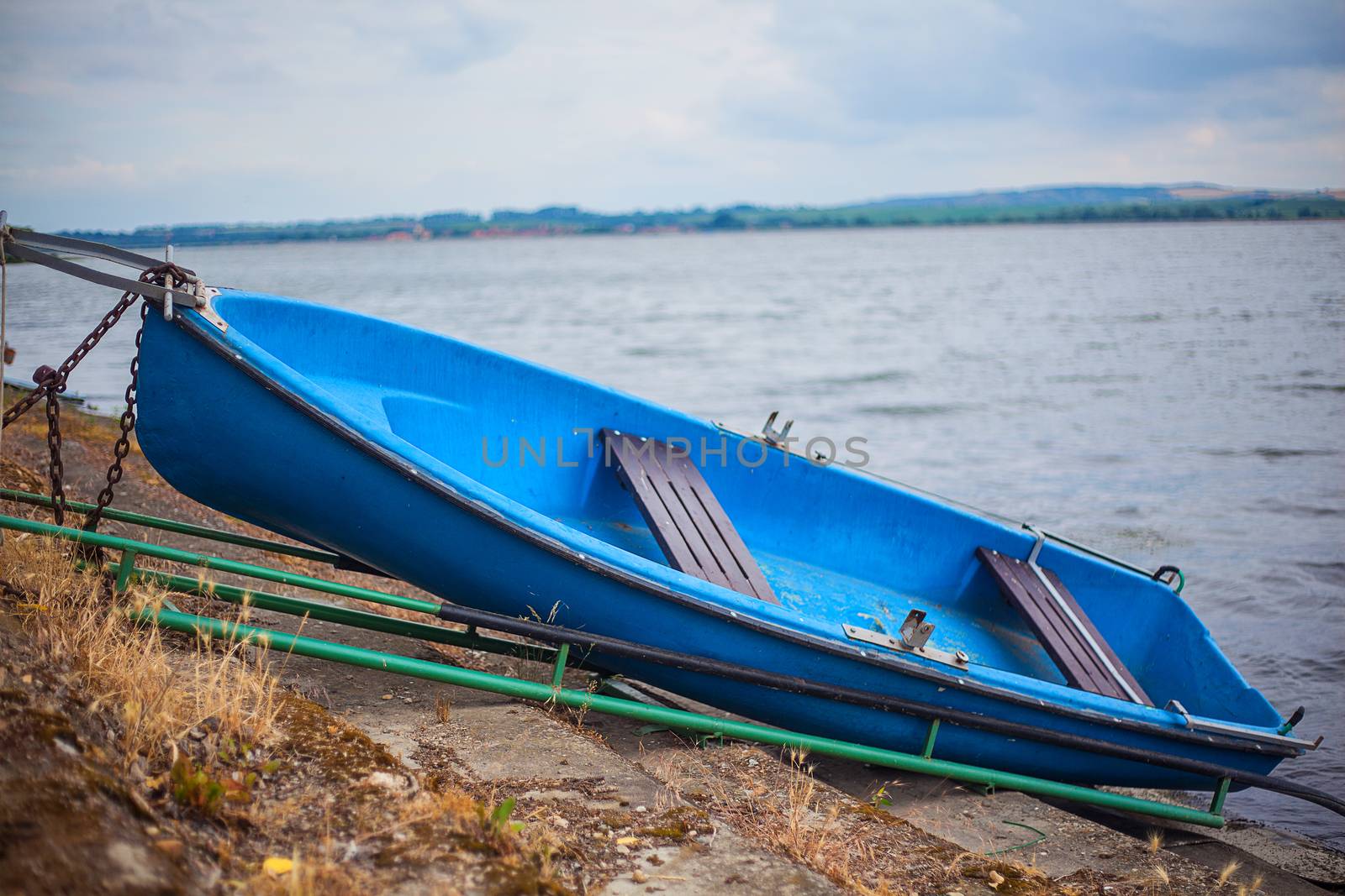 romantic old small boat on shore