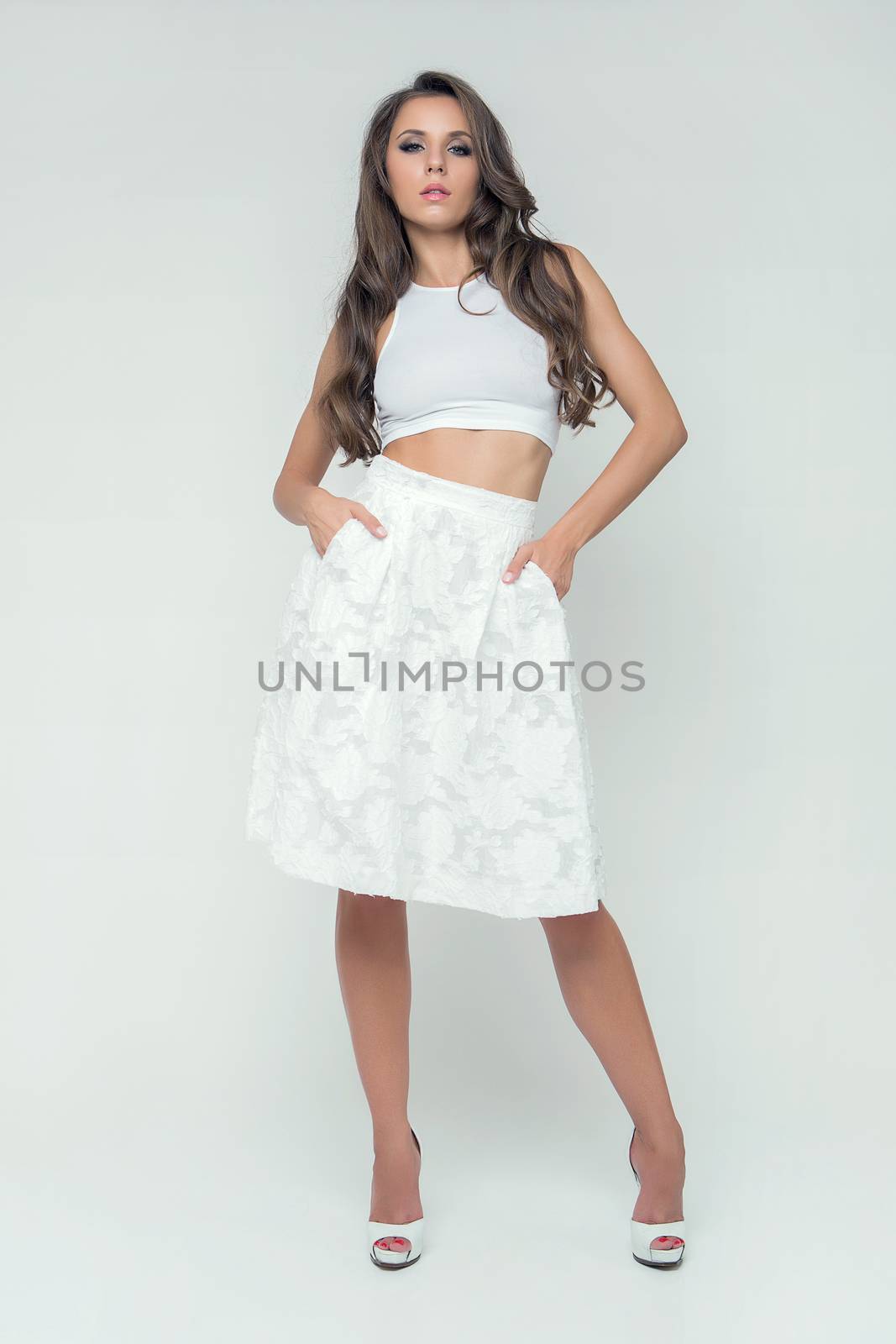 girl in white skirt studio posing romantic by fotoduki