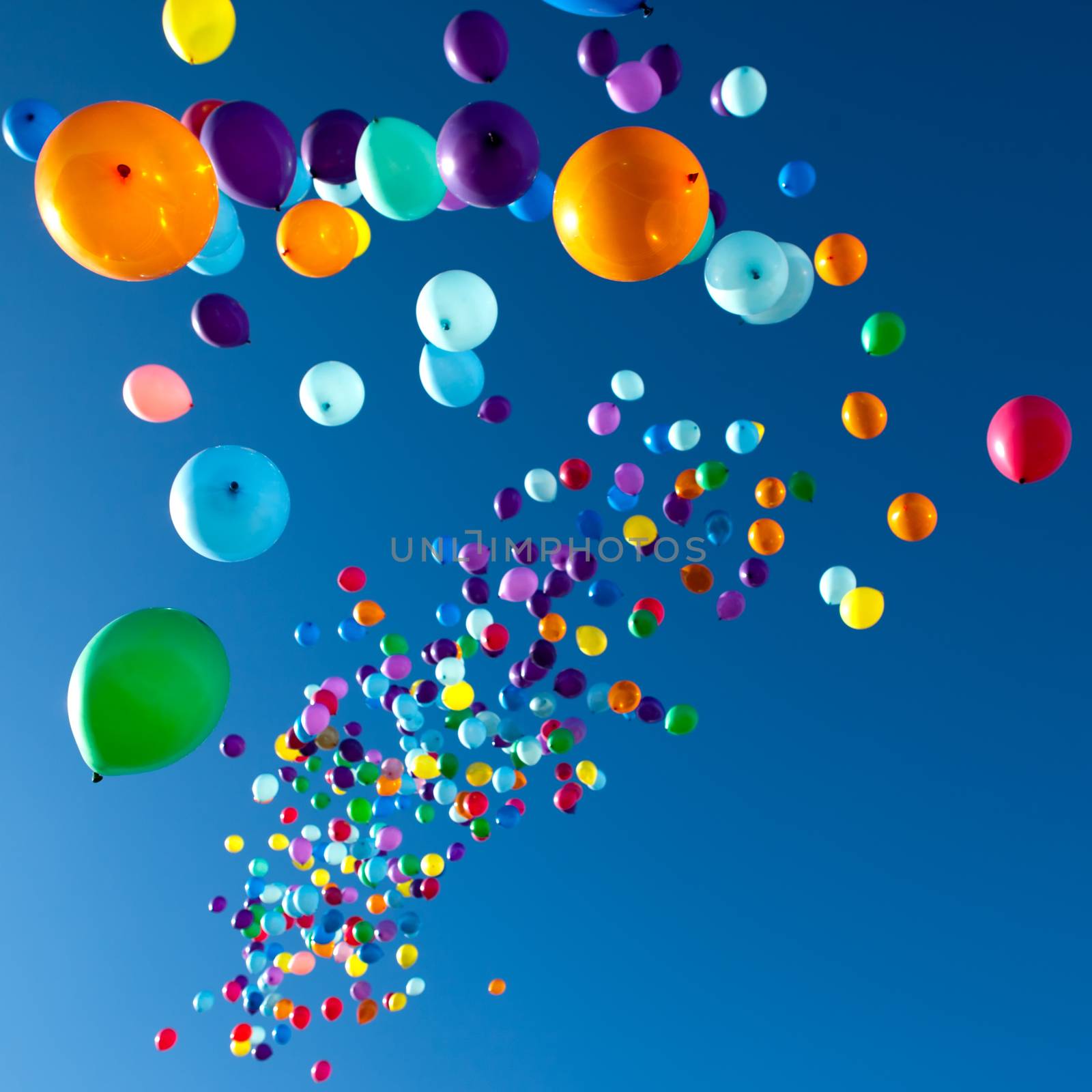 colorful balloons on a blue sky background