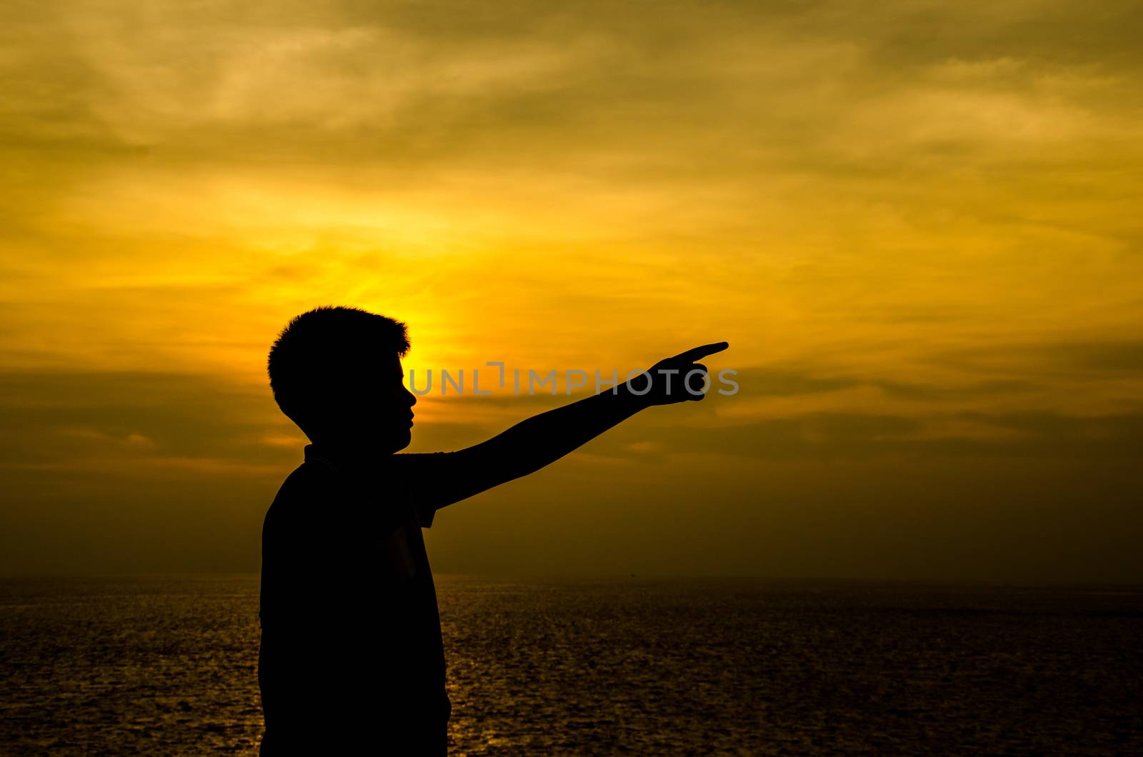 Silhouette of boy. by chatchai