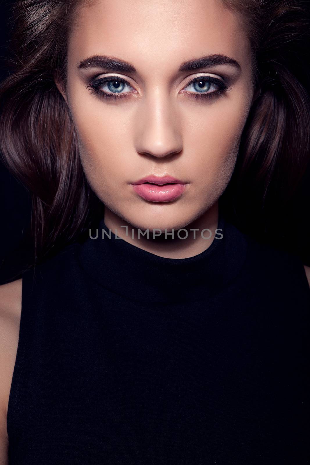 dark beautiful girl portrait with blue eyes