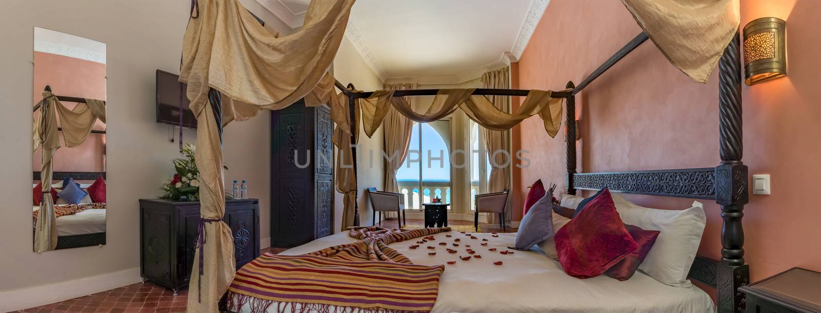 Panoramic view on a luxury bedroom with seaview