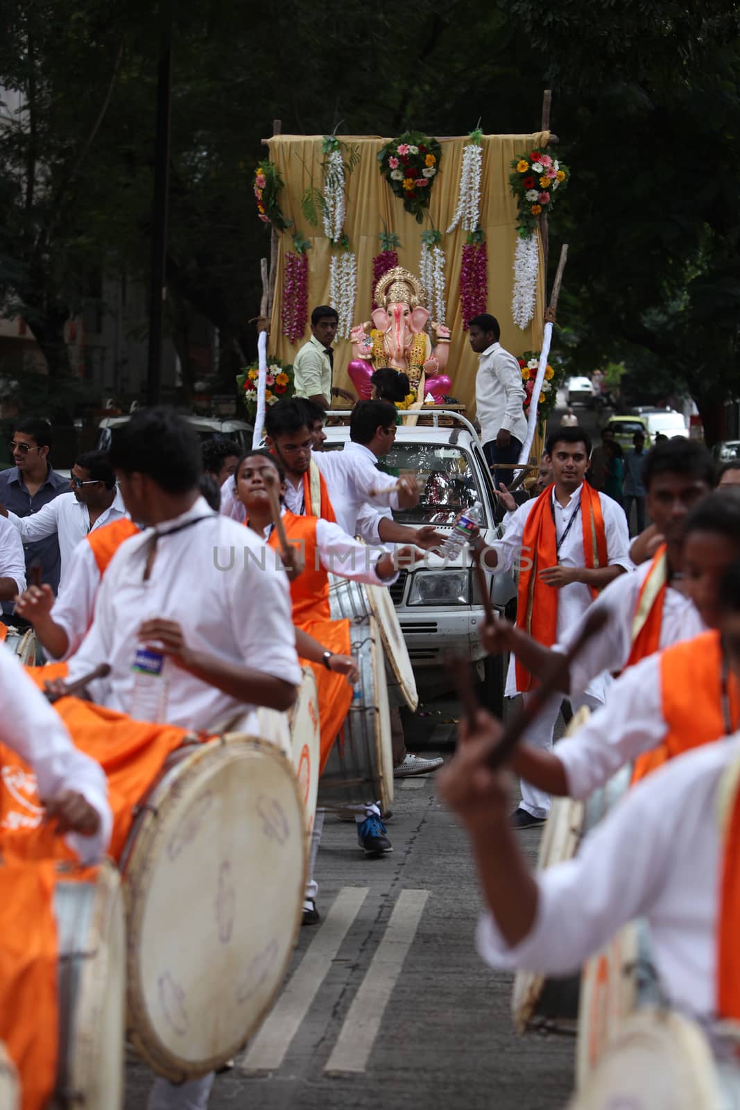 Pune, India - September 17, 2015: Ganesh festival procession being traditionally celebrated Dhol Tasha percussion and dancing.