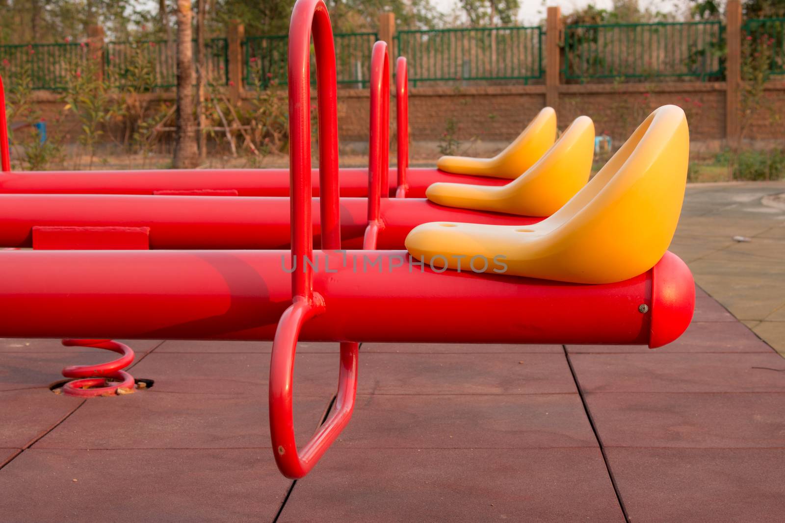 Modern colorful children playground in public park Children playground,seesaw by N_u_T