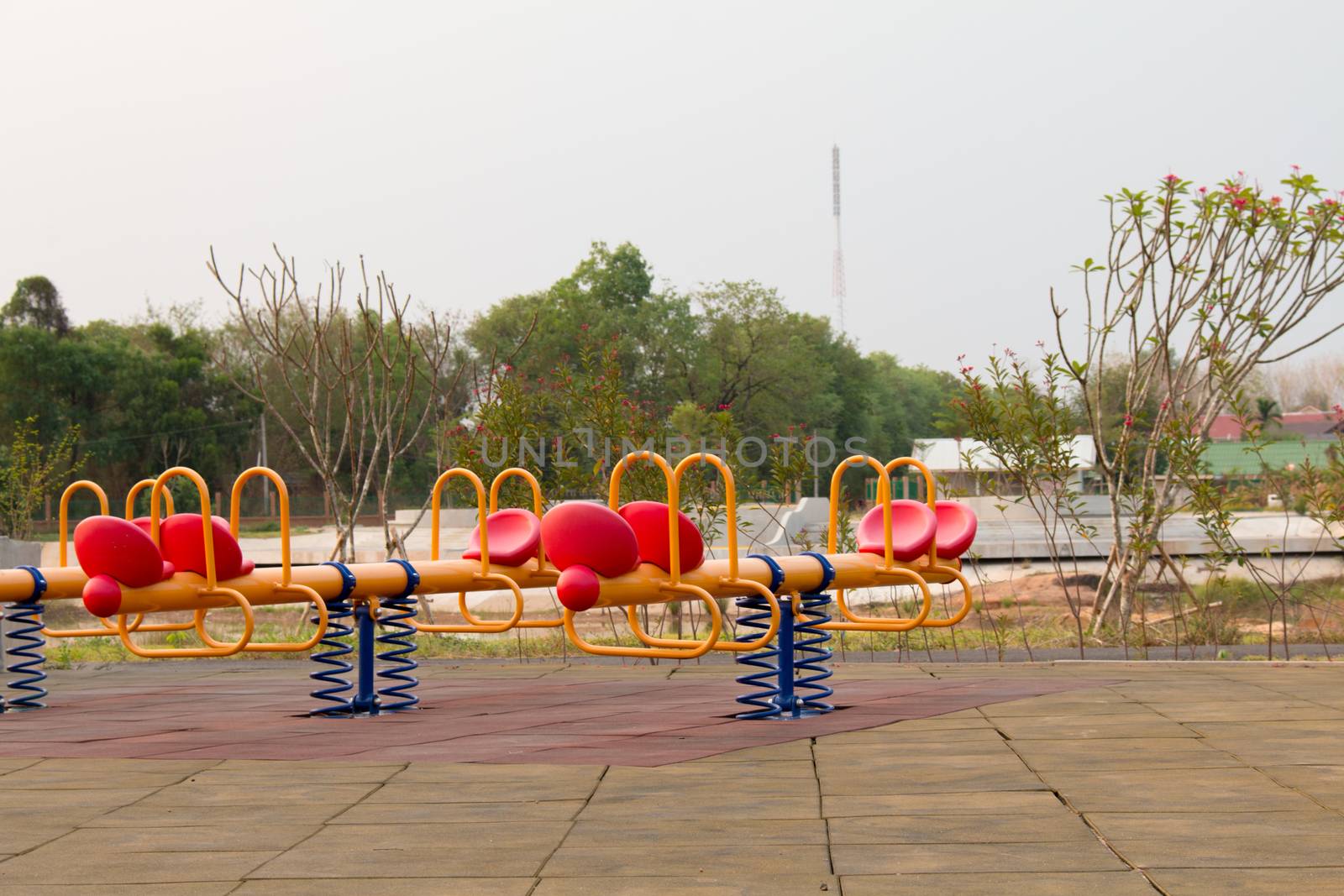 Modern colorful children playground in public park Children playground,seesaw