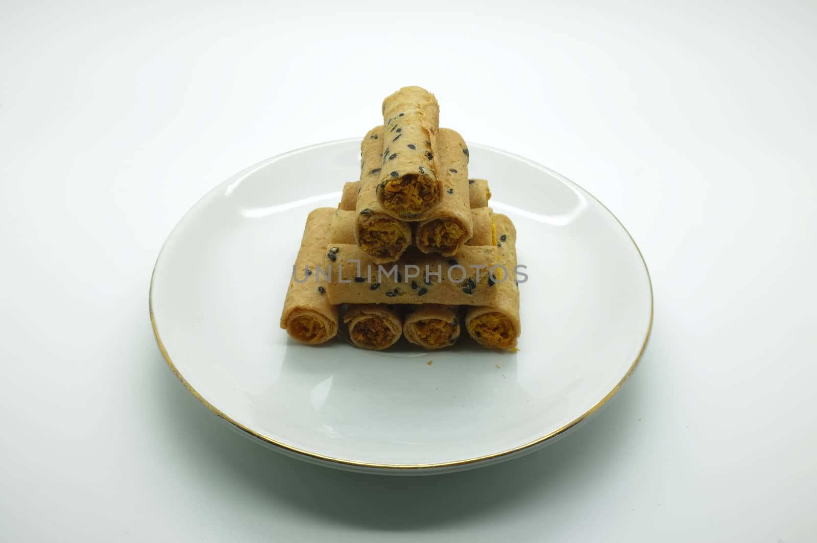 Thai rolled wafer stacking on dish