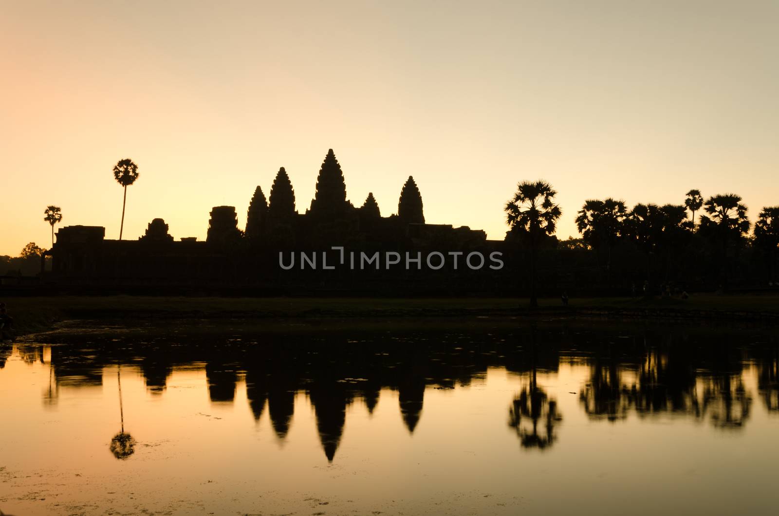 Silhouette of Angkor Wat temple in  Siem Reap by siraanamwong