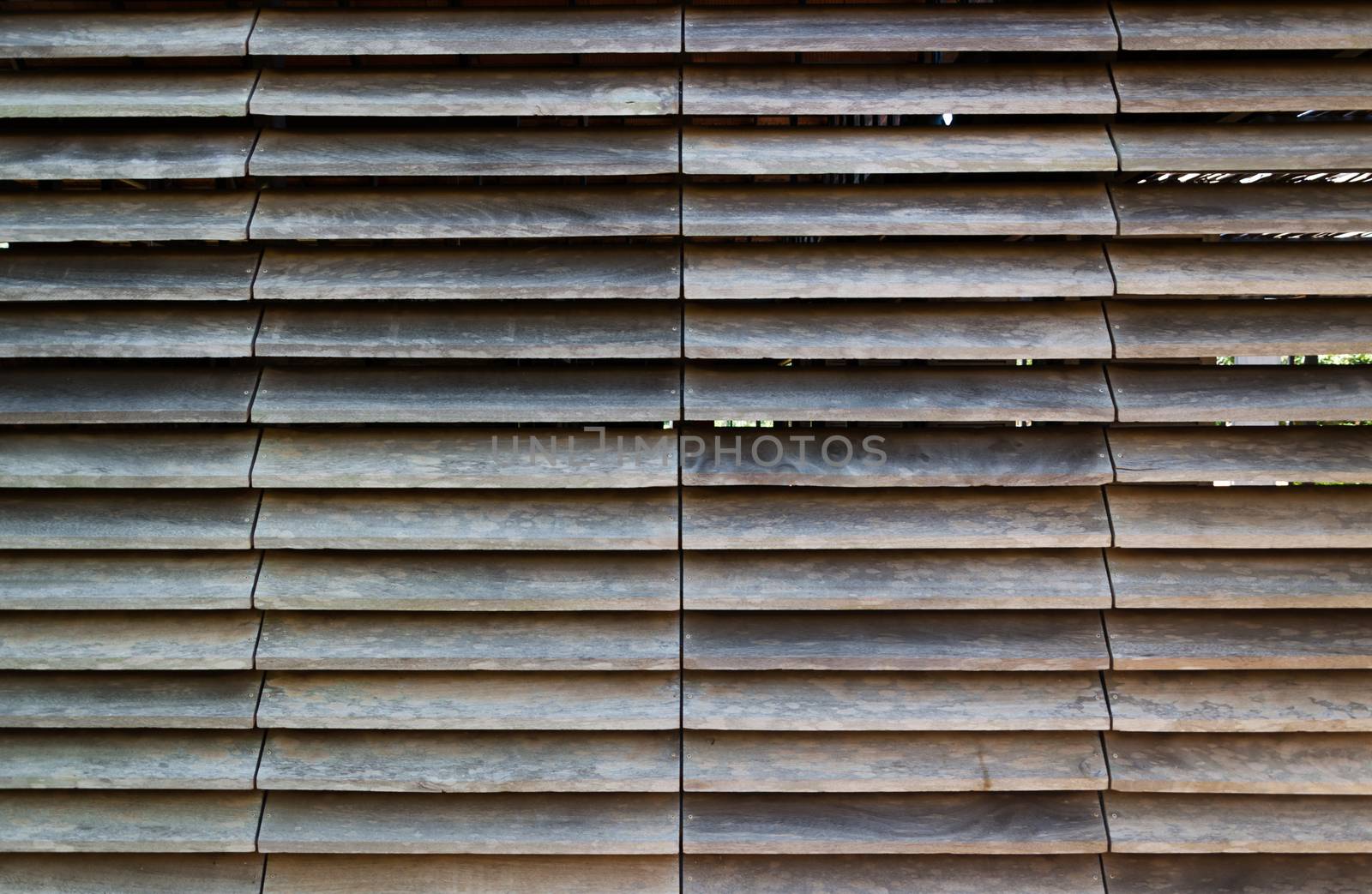 Wooden louvre facade by siraanamwong