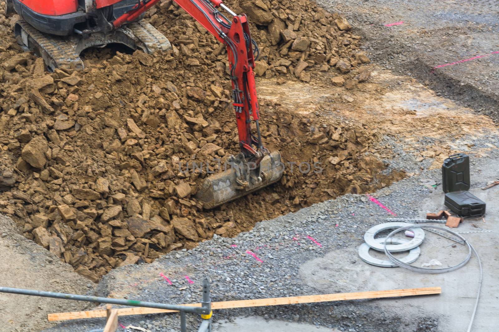 Mini excavator with excavation work for a new construction home.