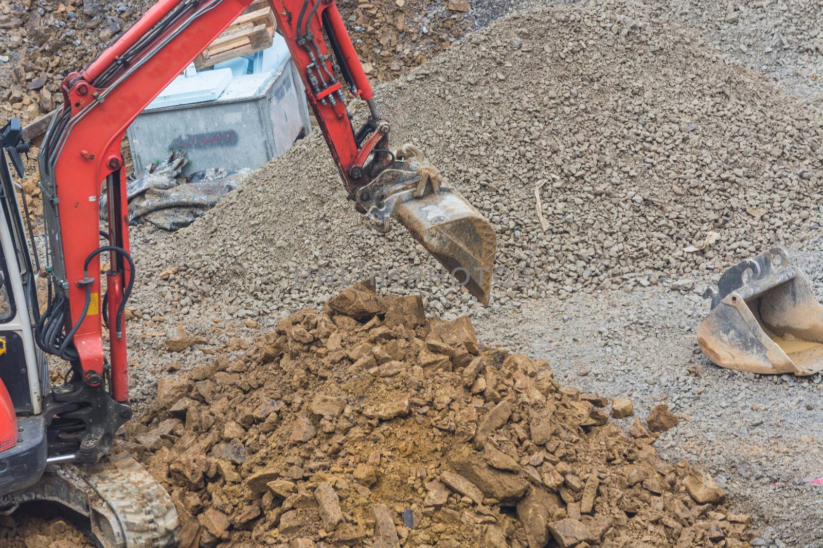 Mini excavator with excavation work for a new construction home.