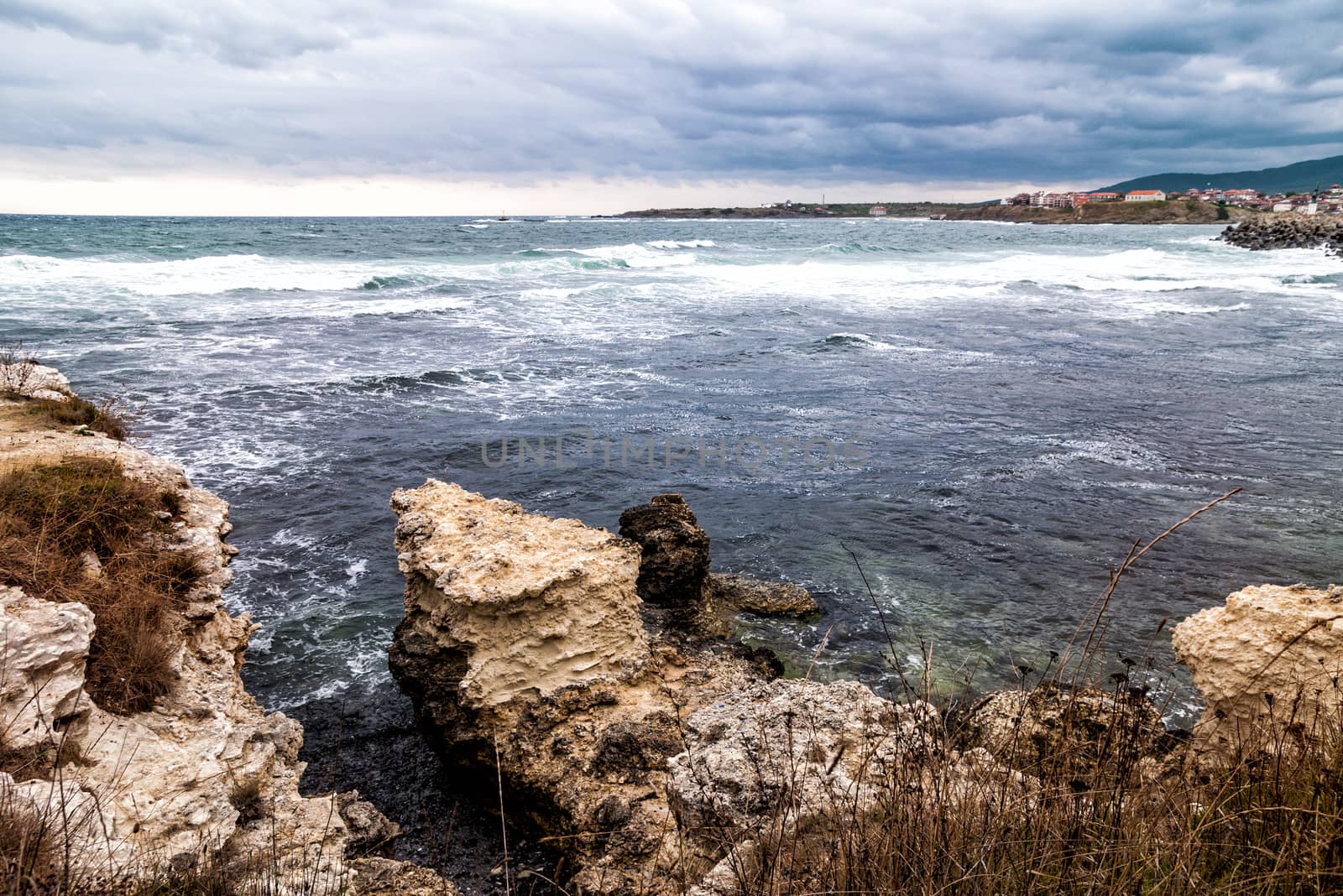 Seascape with stormy clouds and rocks by mitakag