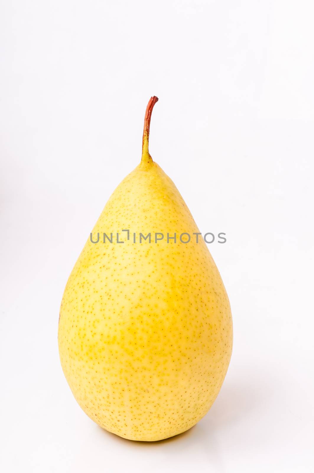 Yellow pear isolated on white background