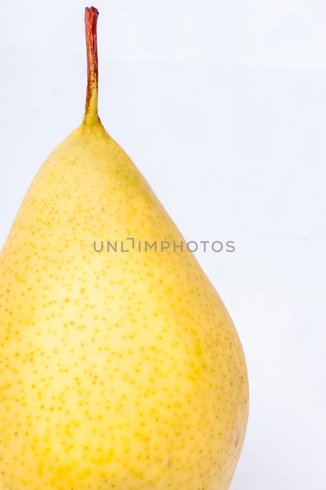 Yellow pear isolated on white background