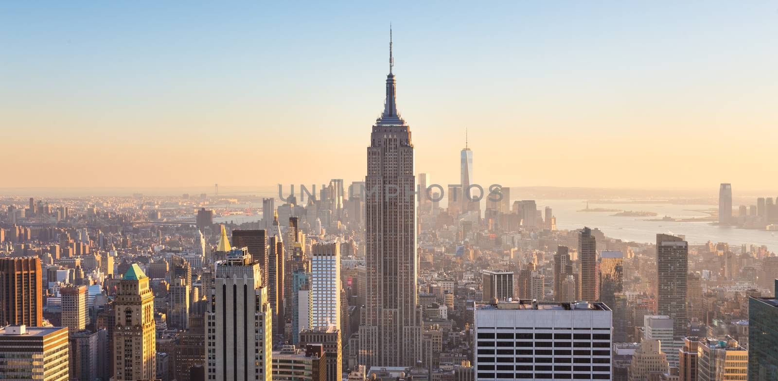 New York City Manhattan skyline in sunset. by kasto