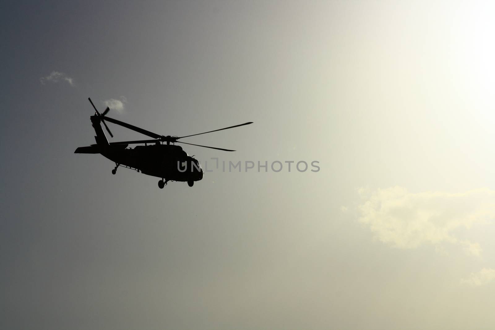 Helicopter at sunset with sun view by mturhanlar