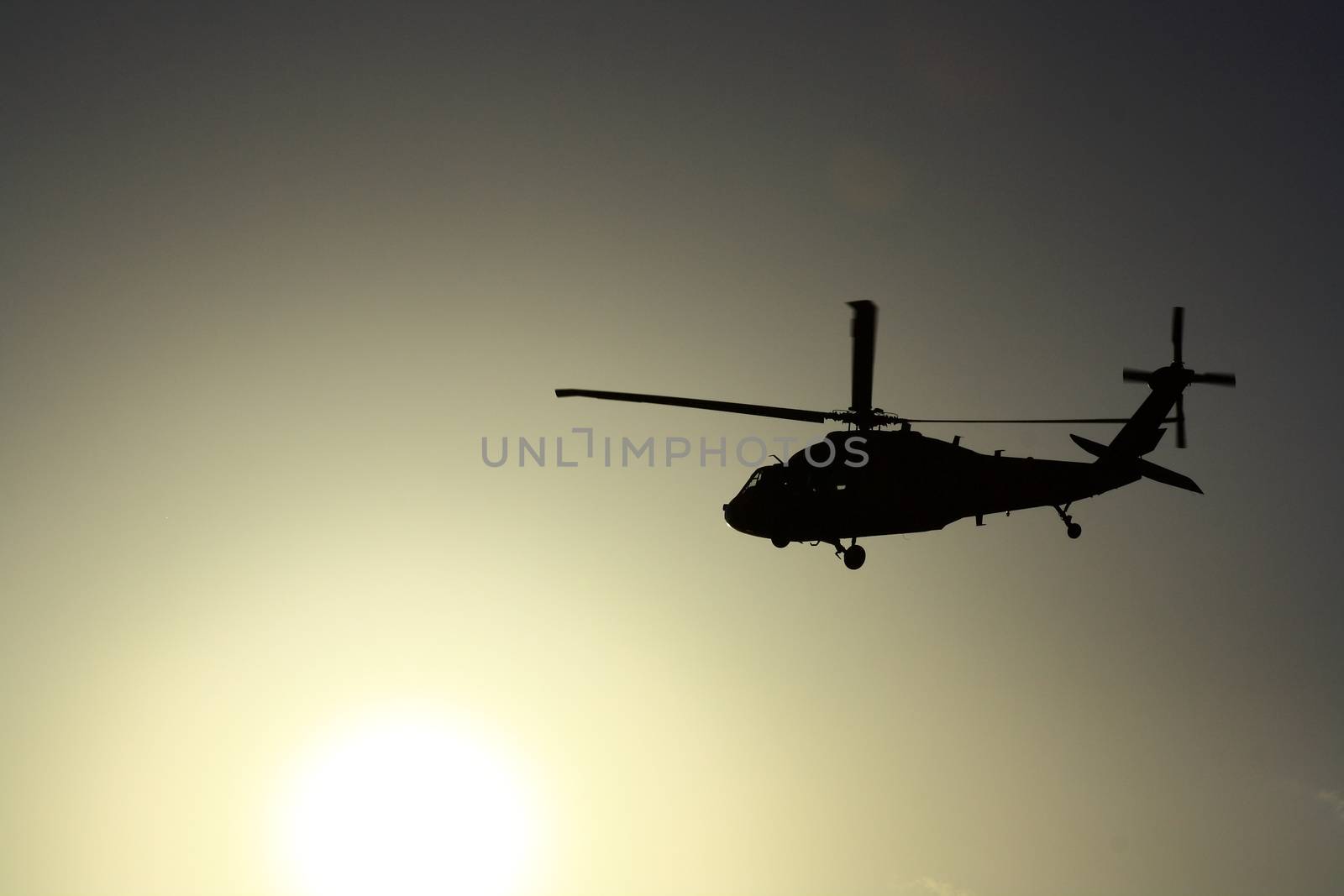 Helicopter at sunset with sun view by mturhanlar