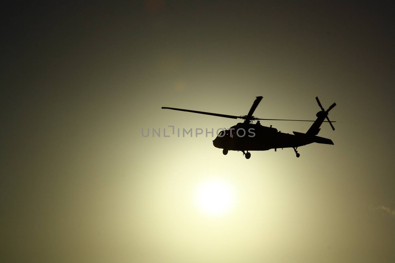 Helicopter at sunset with sun view by mturhanlar