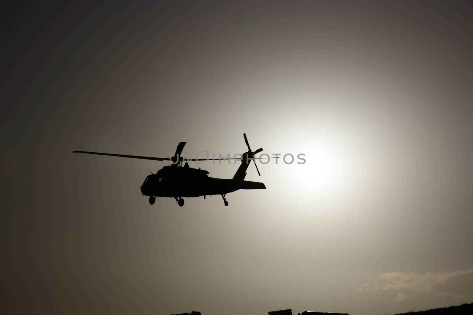 Helicopter at sunset with sun view