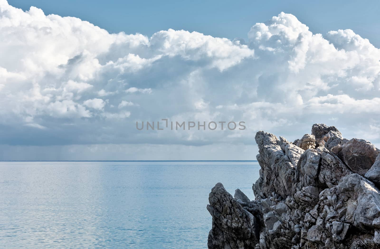 Part of the cliff on the background of sea horizon by Grommik