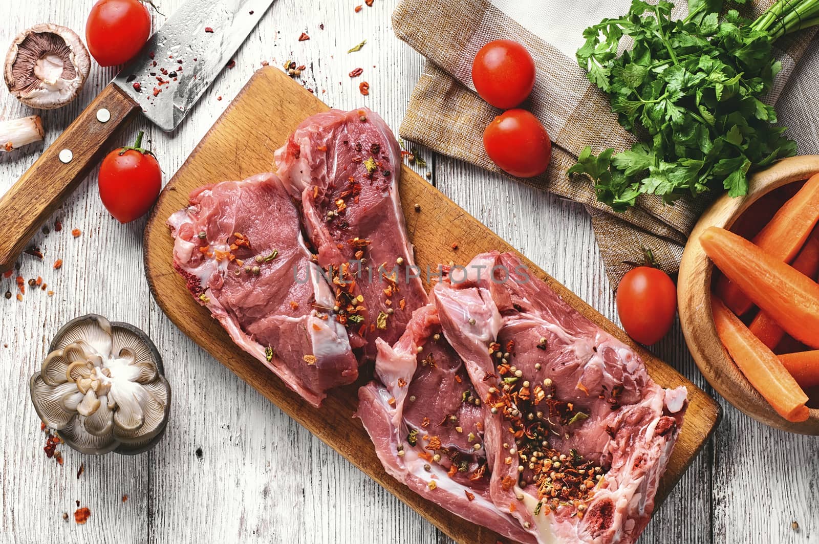 slice of raw meat in the seasoning is prepared for cooking