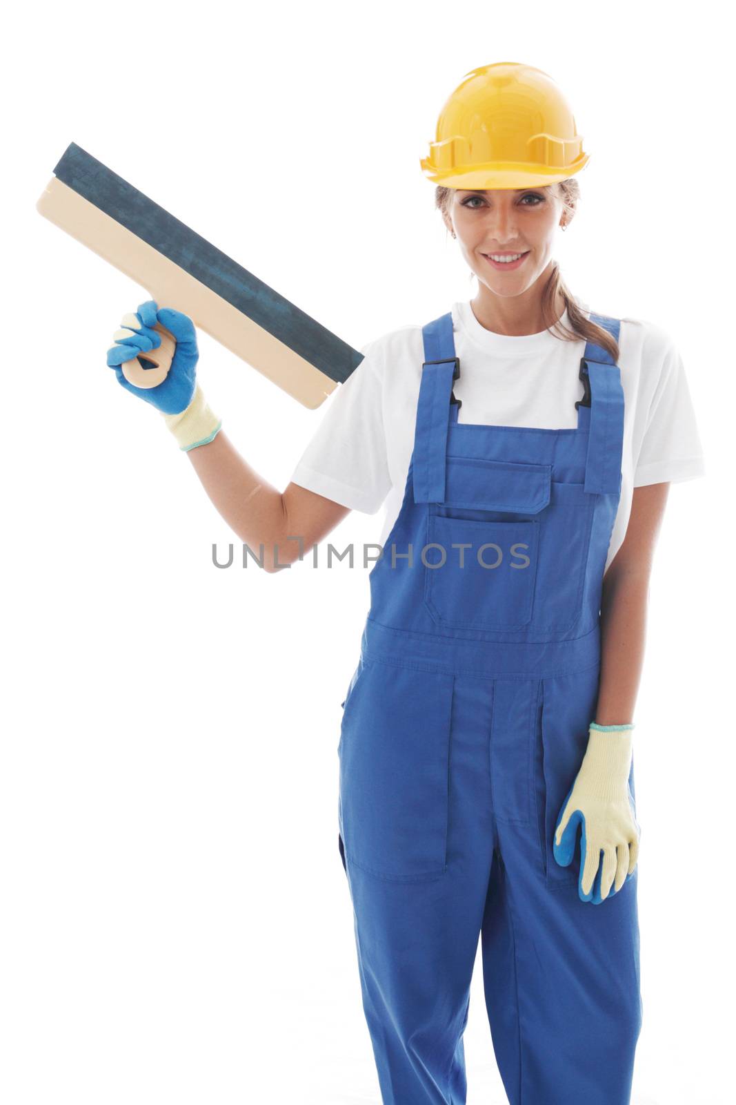 Young beautiful handywoman with masonry trowel isolated on white