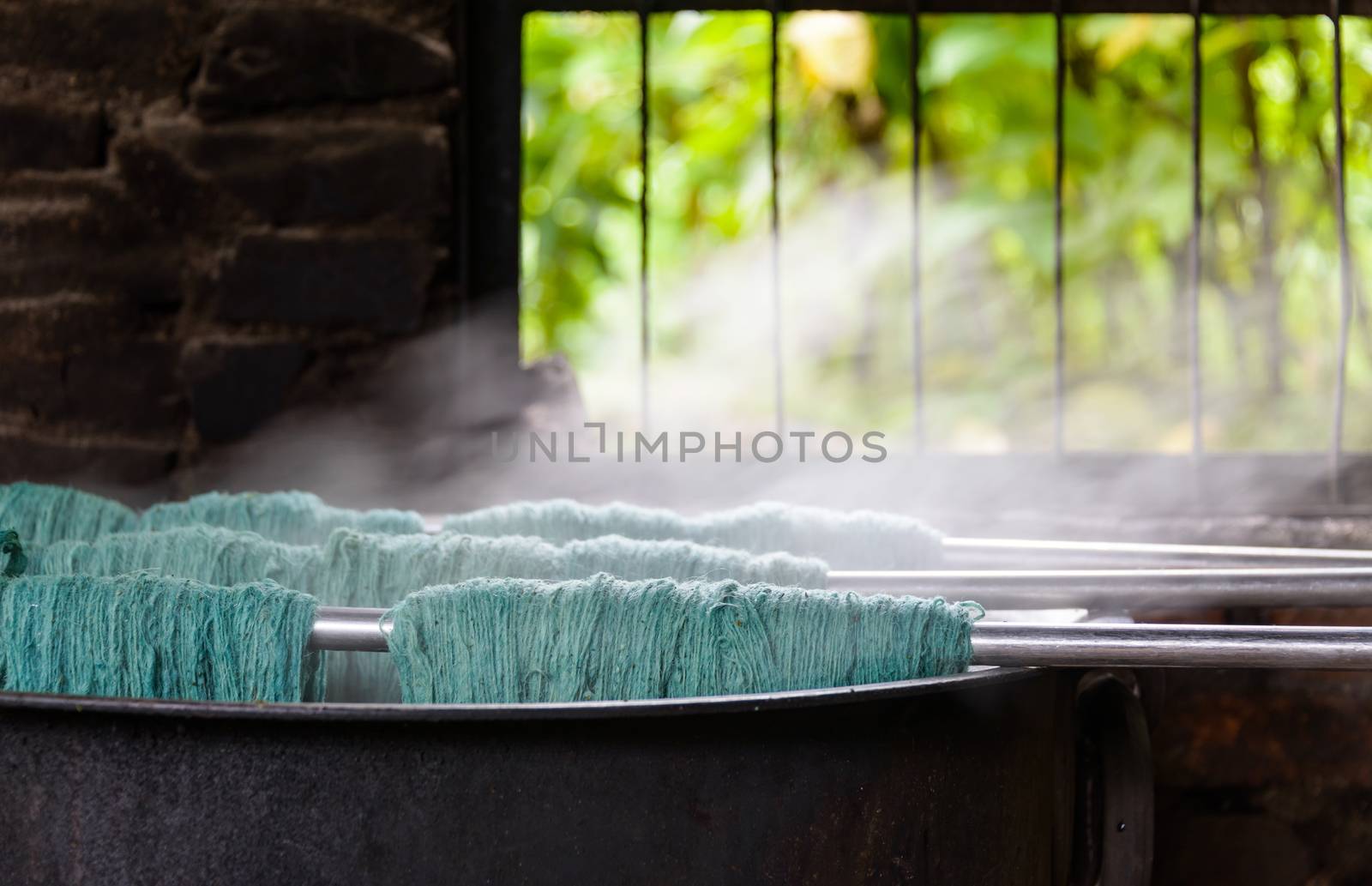 Natural wool dyeing in a carpet factory, Nepal