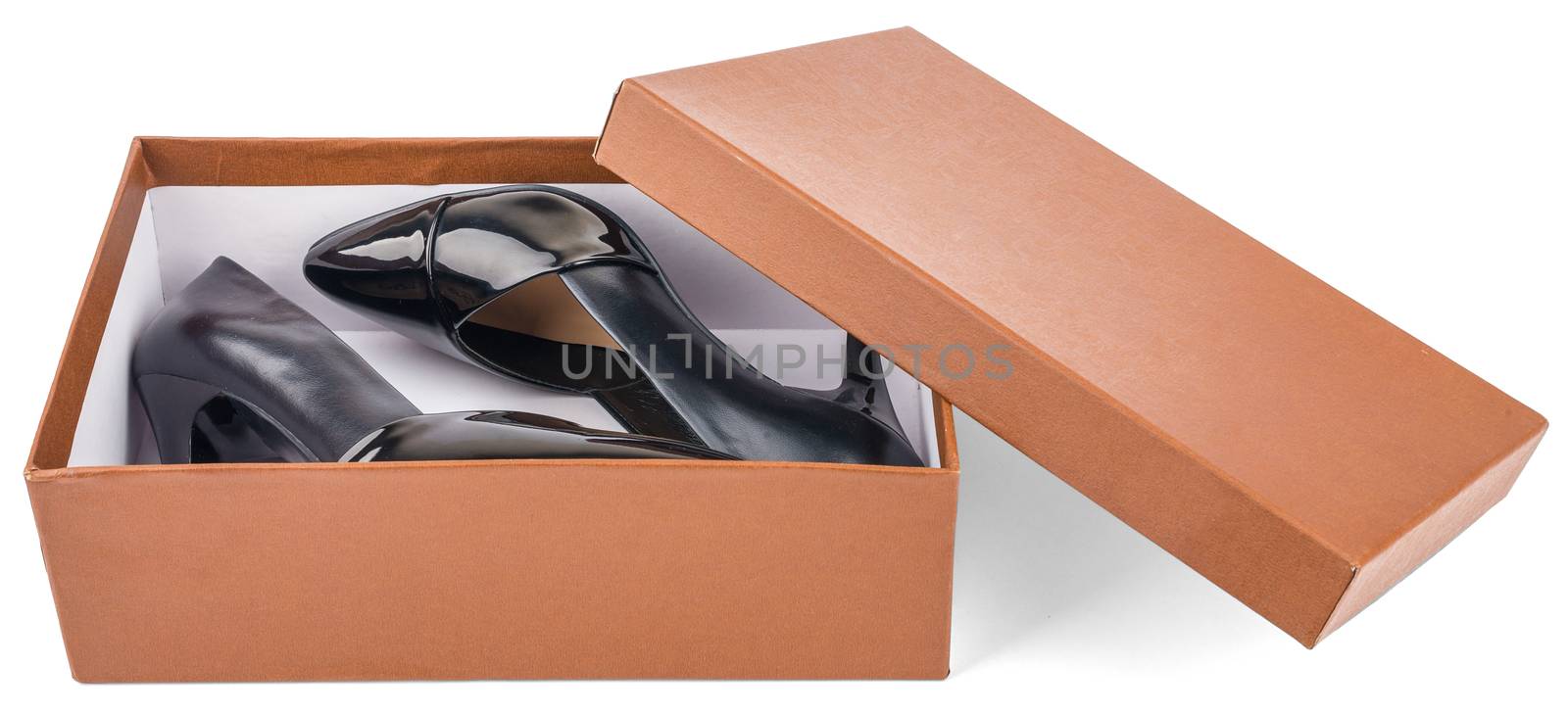 Beautiful classic women shoes on high heels in box isolated on white background