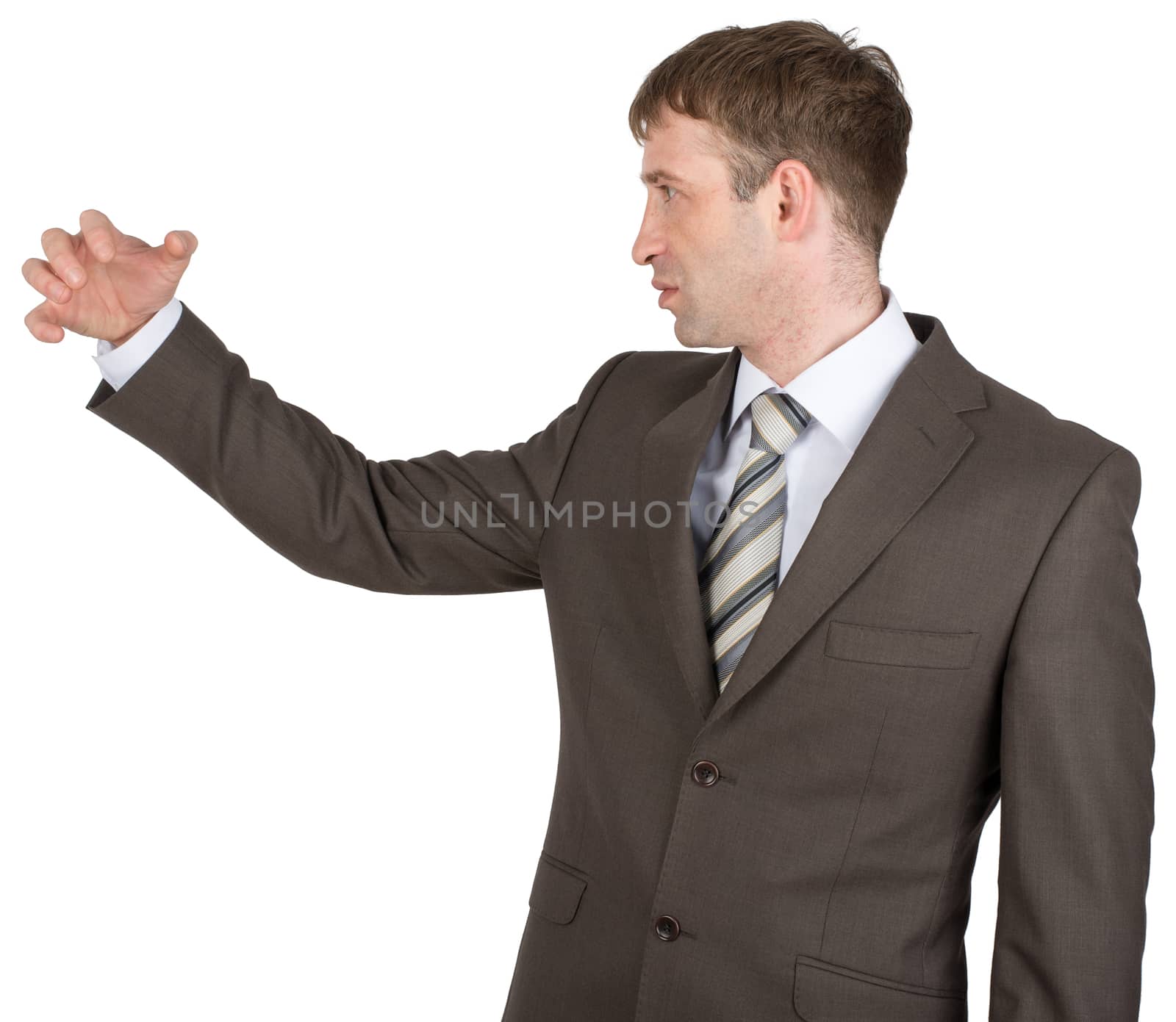 Angry man holding copyspace isolated on white background