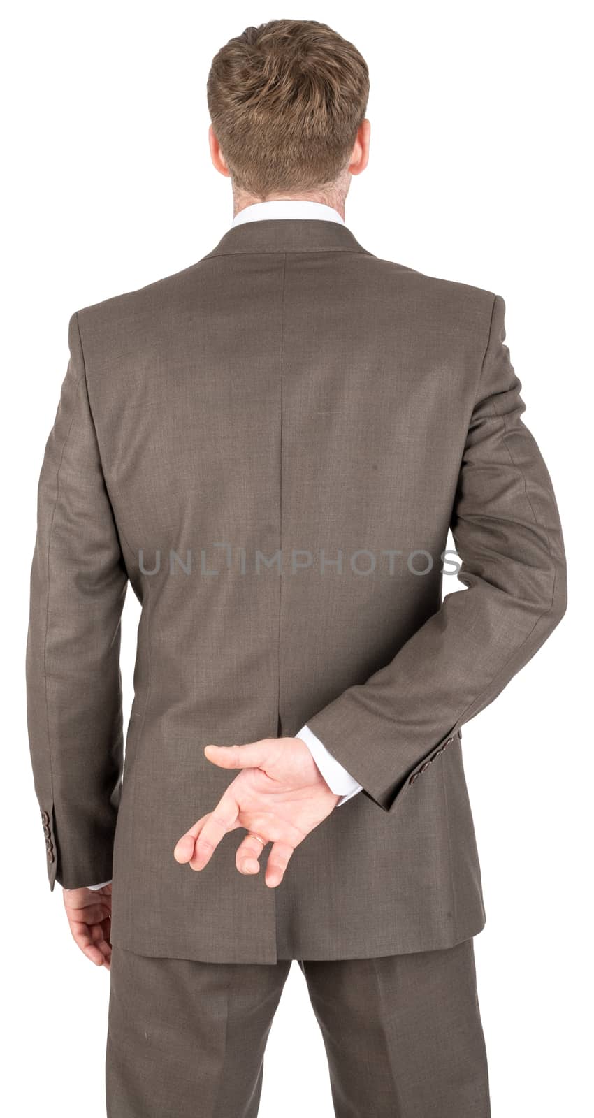 Businessman with his fingers crossed behind his back isolated on white background