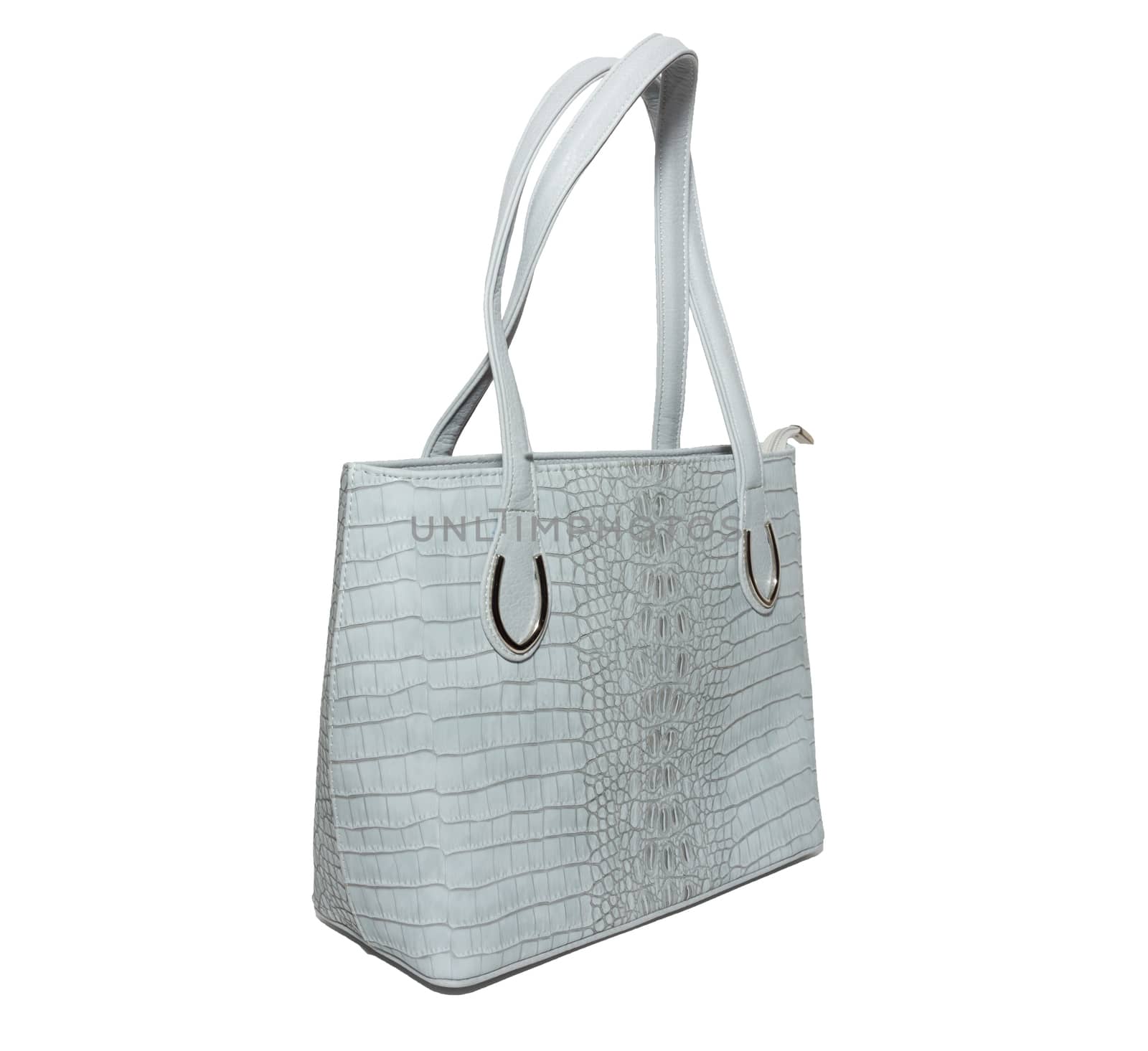 The photograph shows a female handbag on a white background