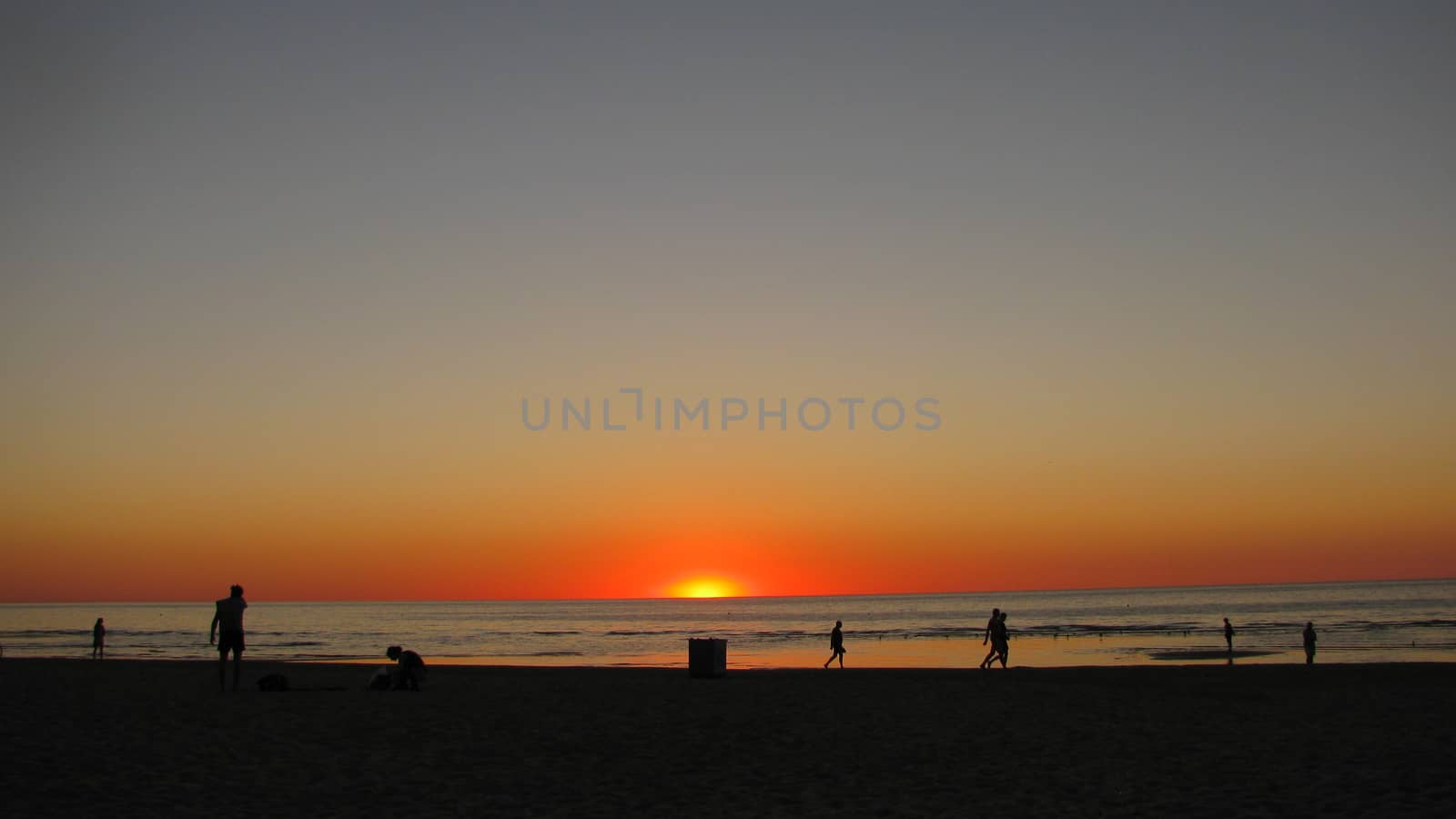 Sunset at the seaside in cloudless weather by Grommik