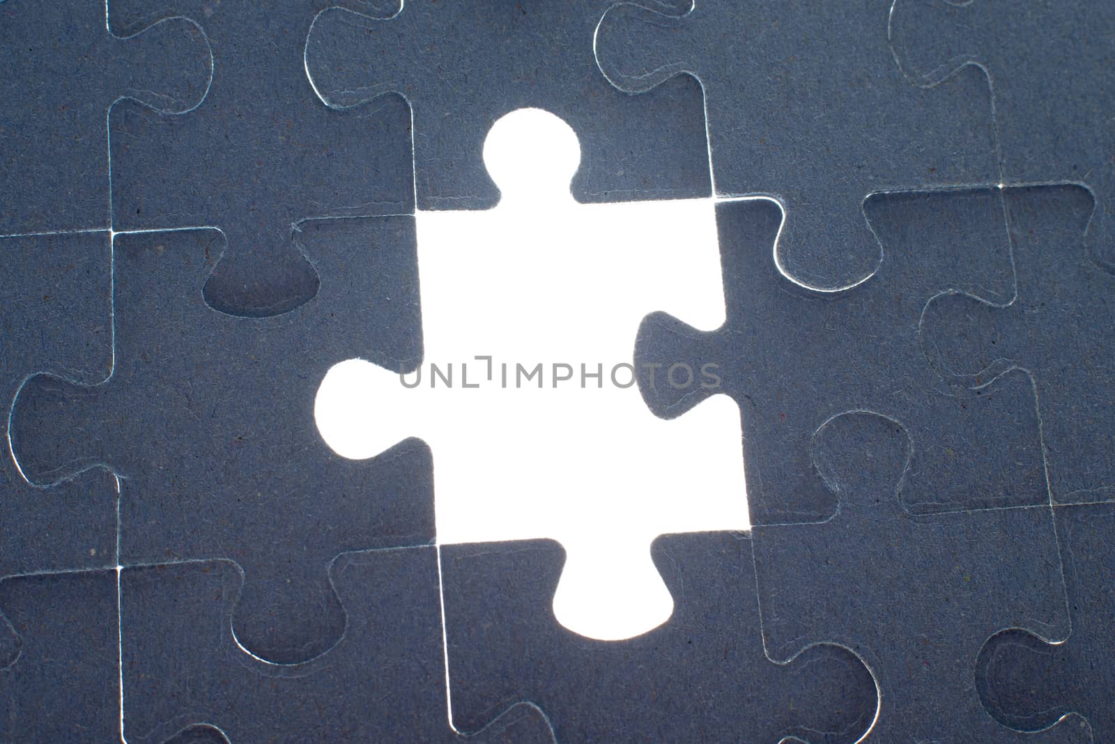 Grey puzzle background with empty space, close up view