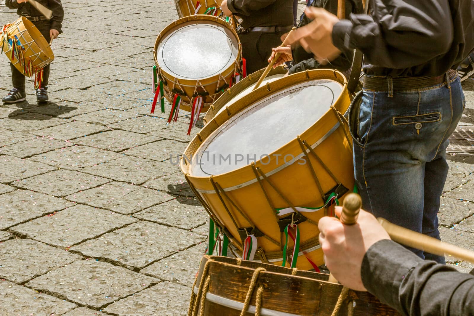 detail of some drummers men in a day of celebration