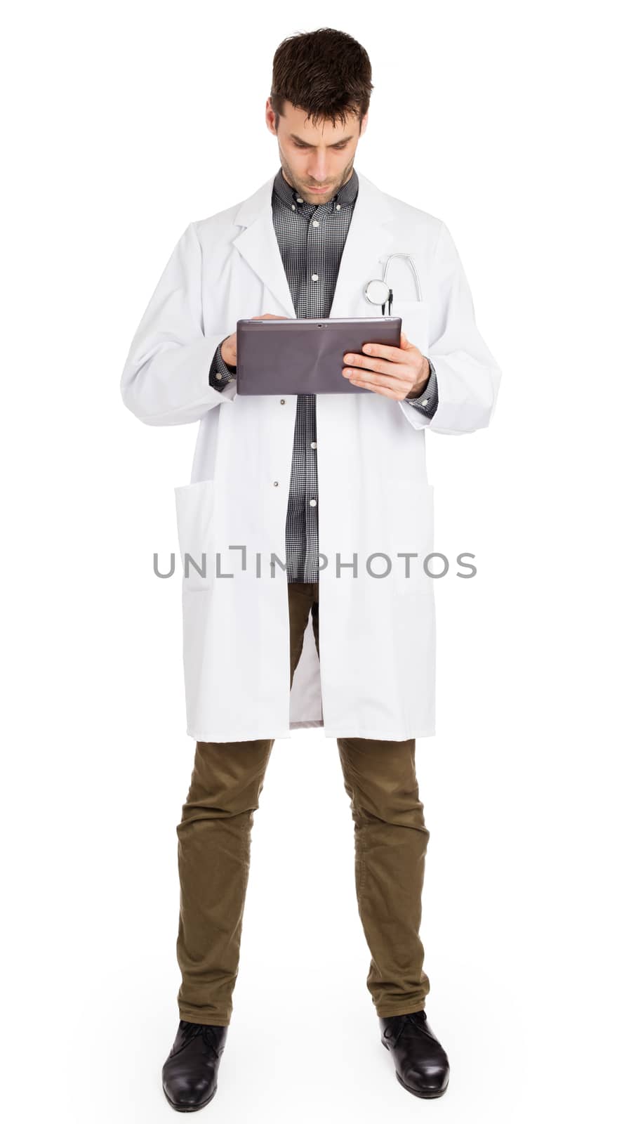 Doctor holding tablet with copy space and clipping path for the  by michaklootwijk