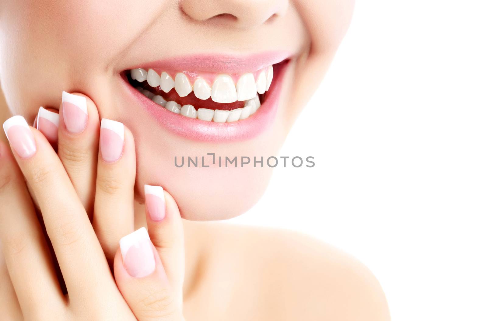 Cheerful female with fresh clear skin, white background