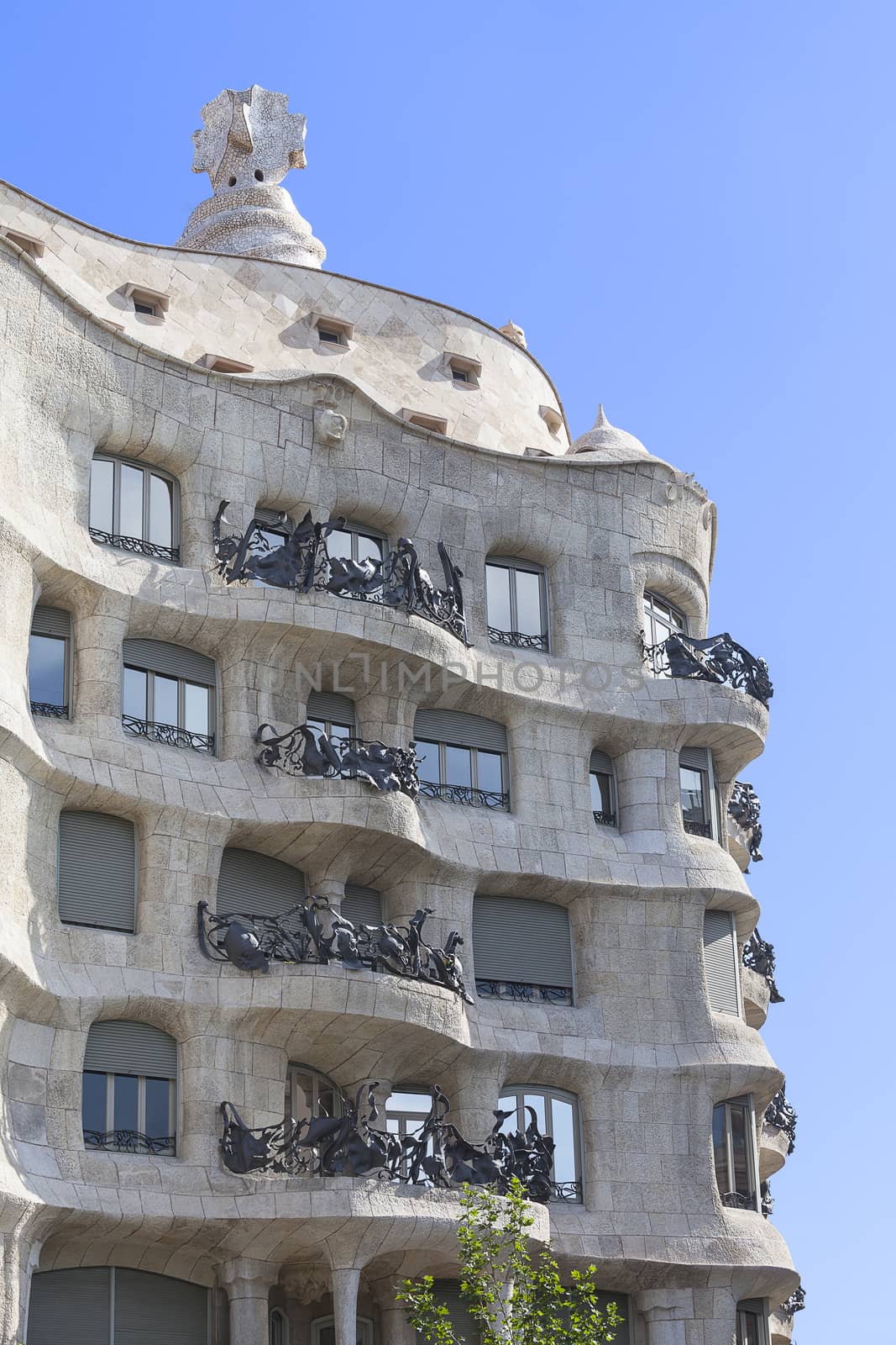  Casa Mila known as La Pedrera - facade with balconies of modernist building designed by Antoni Gaudí,  Barcelona, Spain
