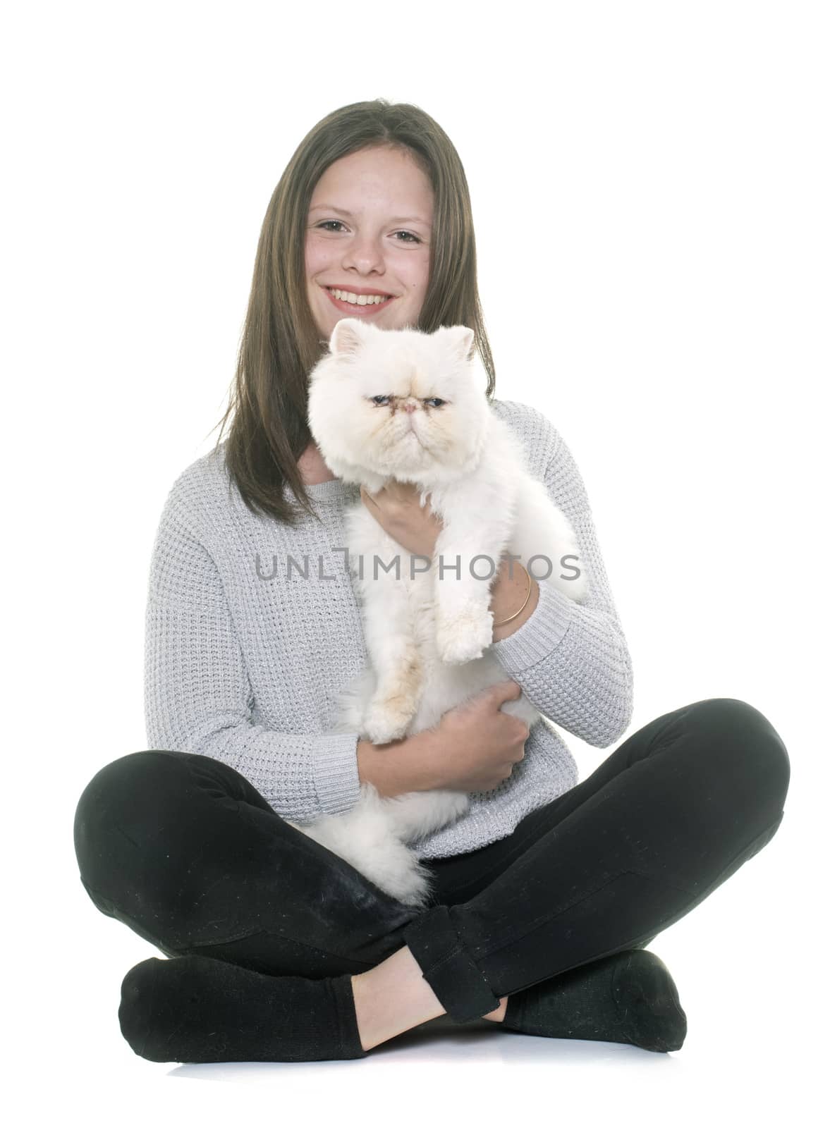 white persian cat and teenager in front of white background