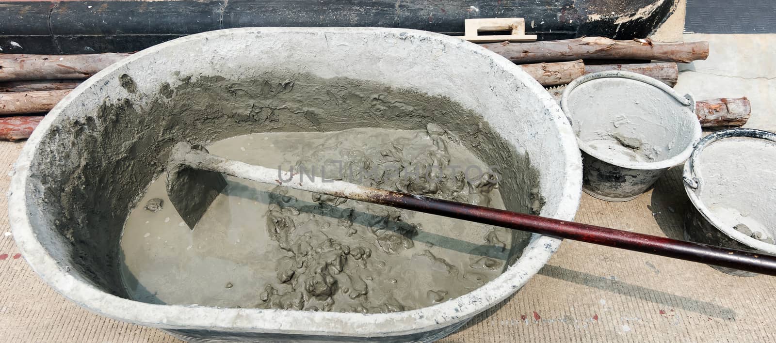 Mixing a cement in salver for applying construction by suthee