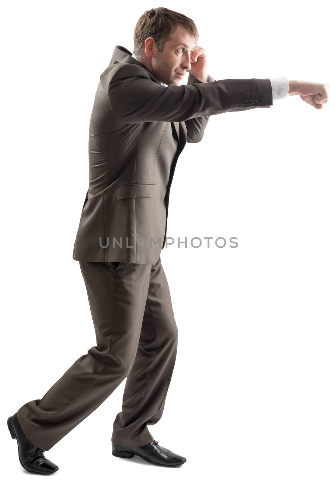 Confident businessman ready for fight isolated on white background