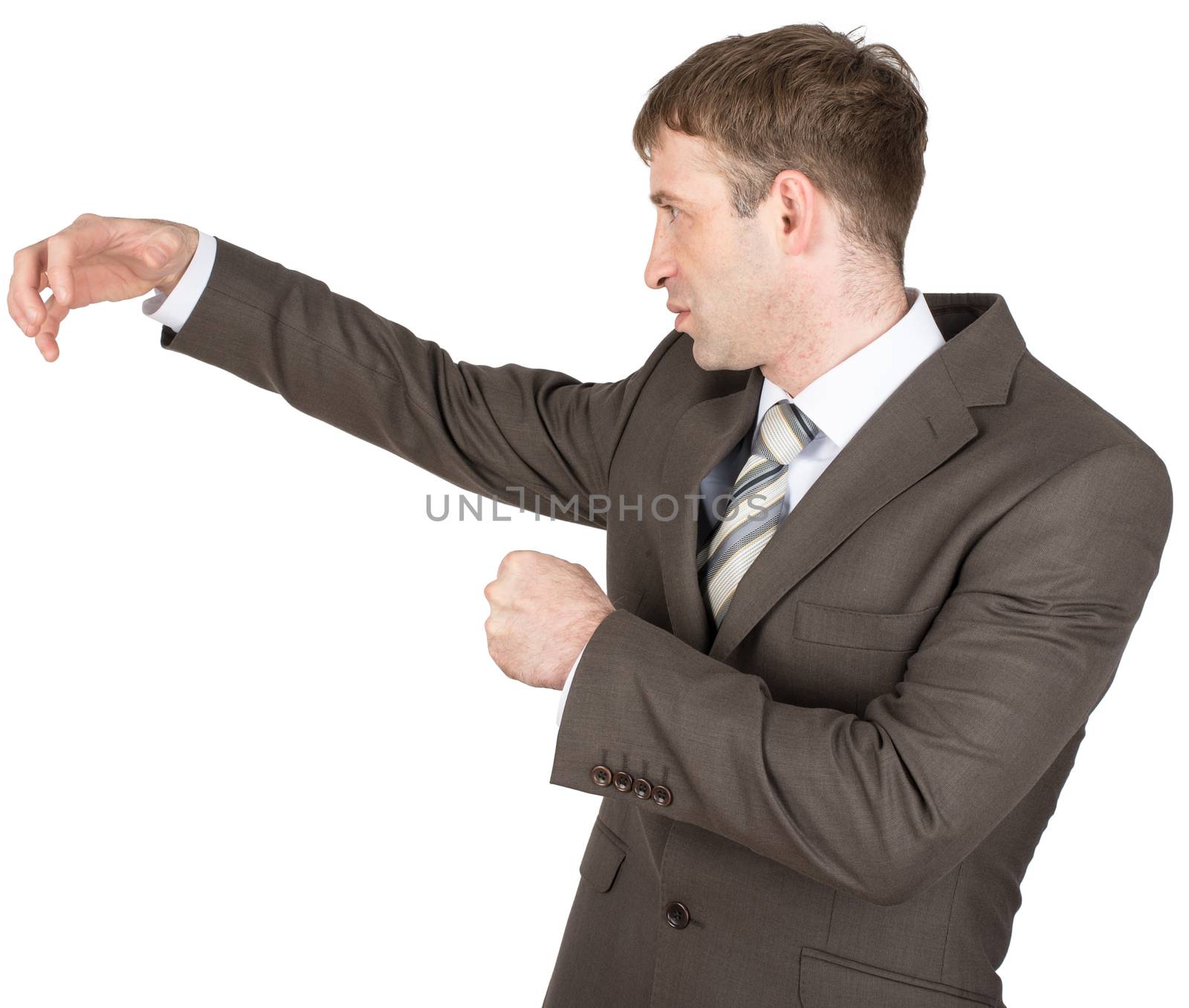Holding something of hand shape on white background. Businessman hitting copyspace