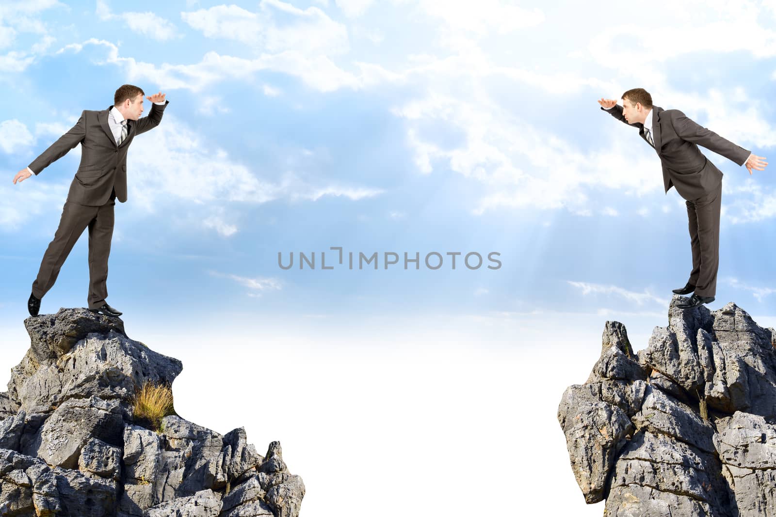 Businessmen holding their hands near brows  by cherezoff