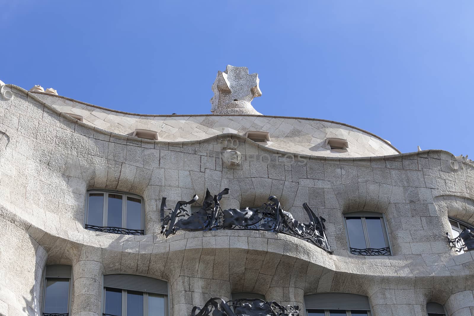  Casa Mila known as La Pedrera - facade with balconies of modernist building designed by Antoni Gaudí,  Barcelona, Spain