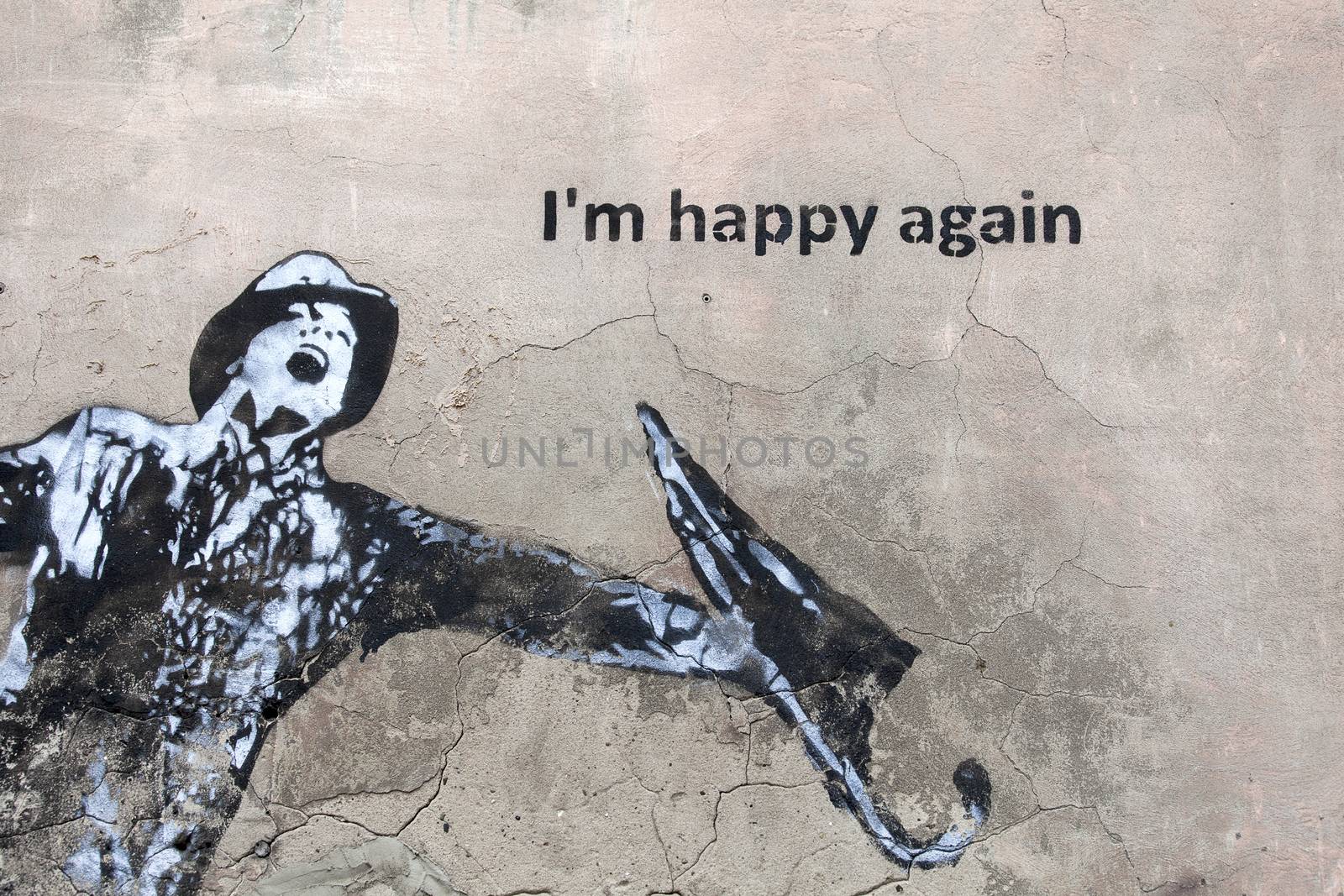 I'am happy again - mural street art by unidentified artist in jewish district  Kazimierz in Krakow, Poland