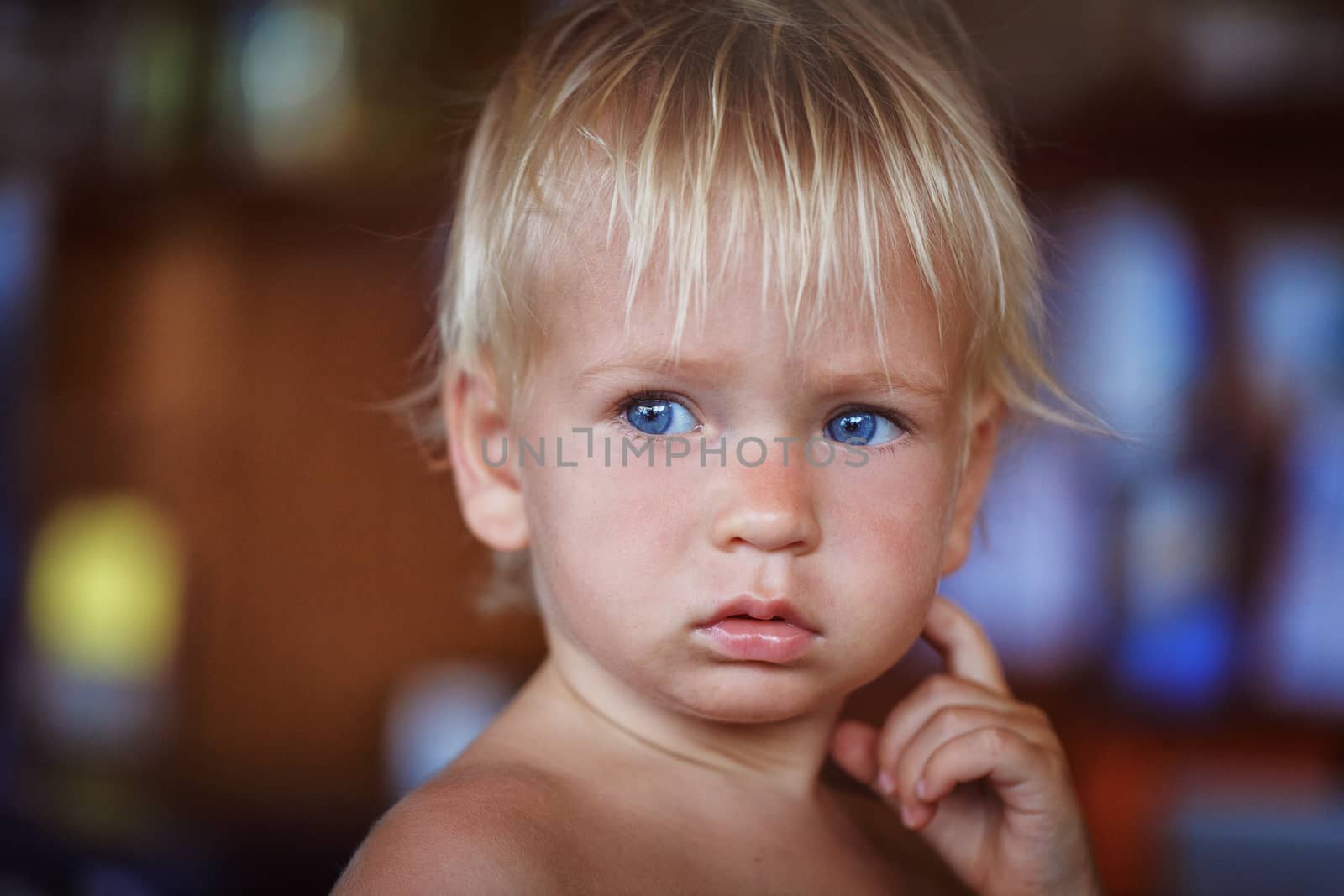 beauty blonde young boy with blue eyes in thailand
